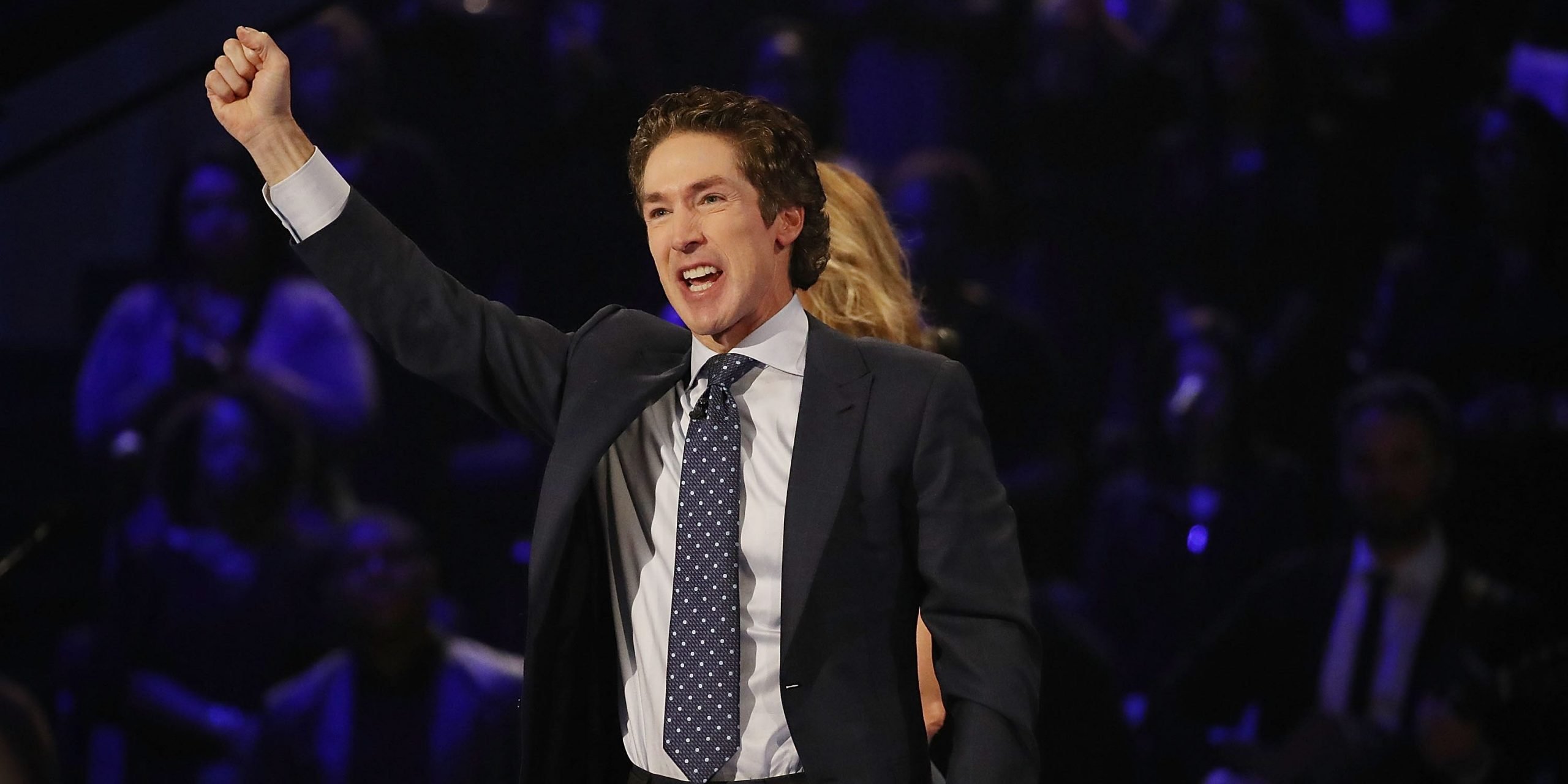 Joel Osteen, the pastor of Lakewood Church, conducts a service at his church.