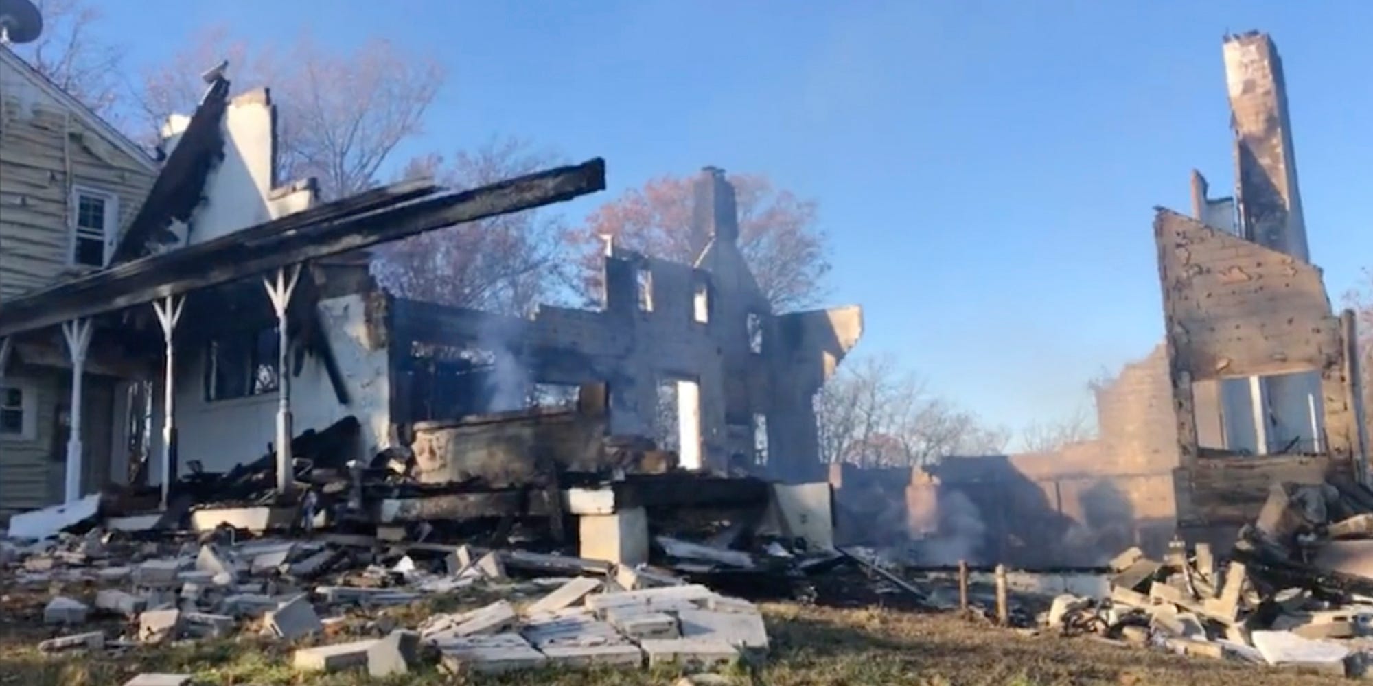 This photo provided by the Montgomery County Fire Rescue Service shows the remains of a home that was heavily damaged by fire after the homeowner attempted to use smoke to purge snakes from the house, in Poolesville, Md.