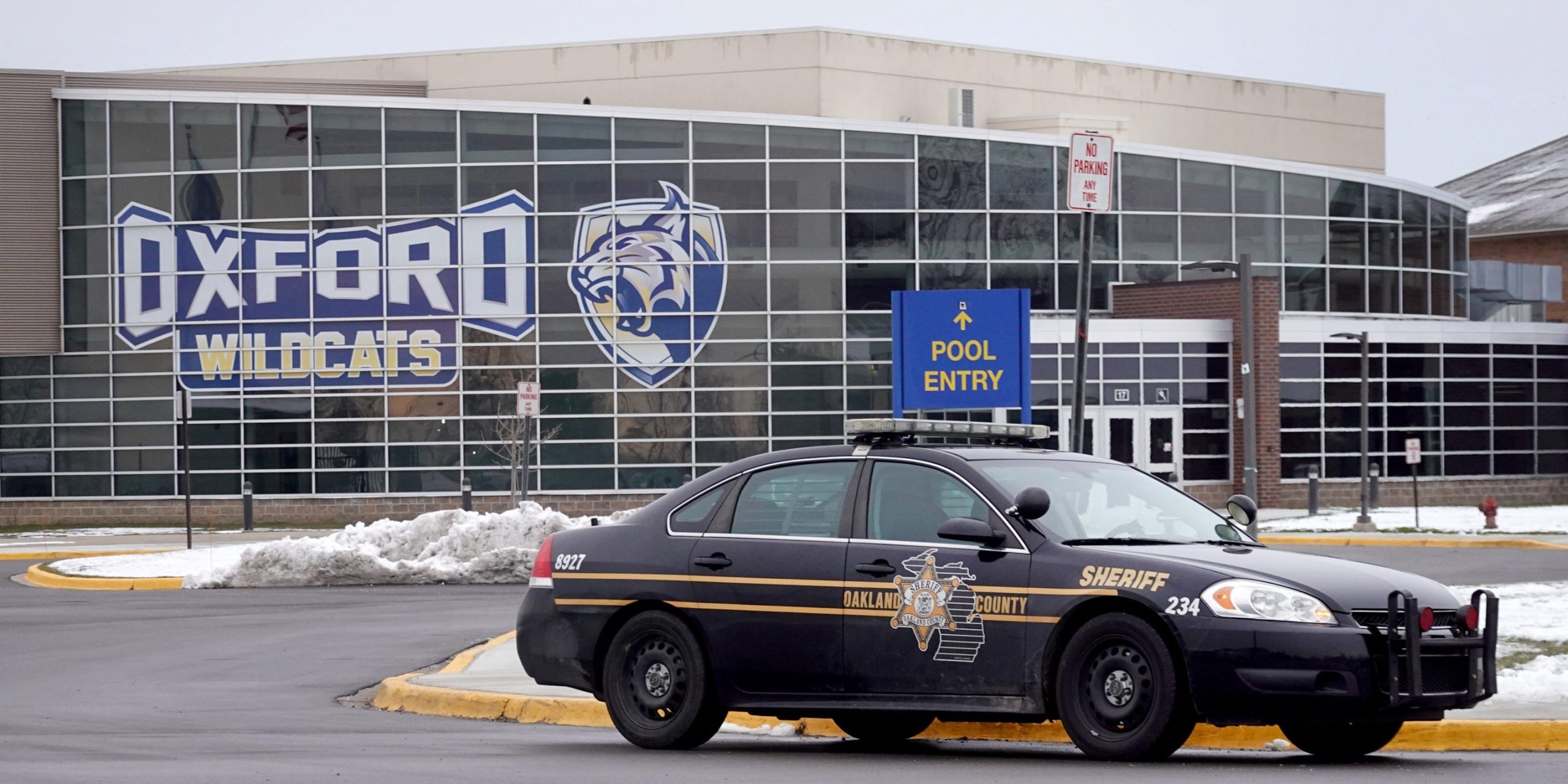 A police vehicle remains parked outside of Oxford High School on December 01, 2021 in Oxford, Michigan.