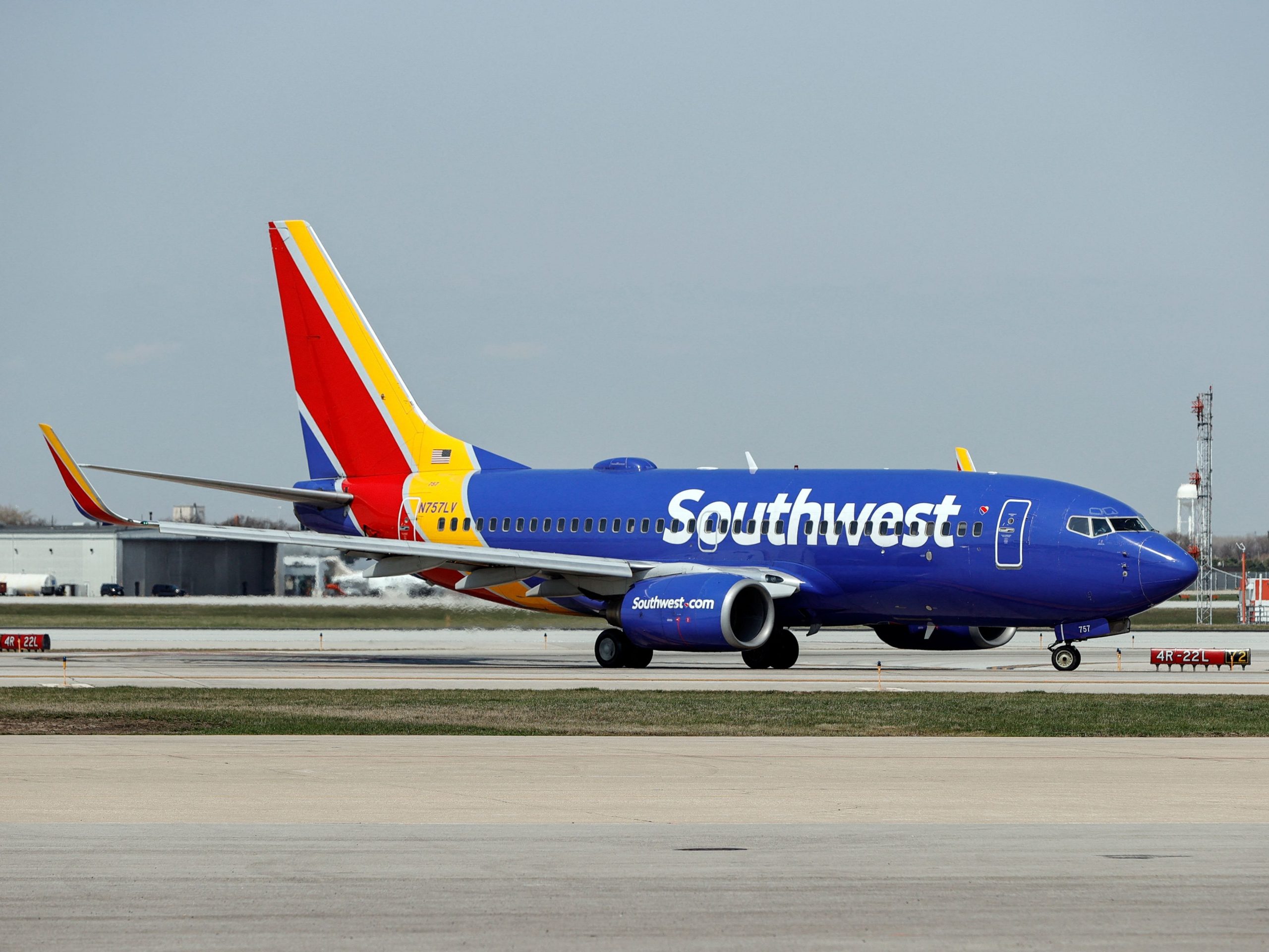 A Southwest Airlines Boeing 737-7H4 jet taxis to the gate