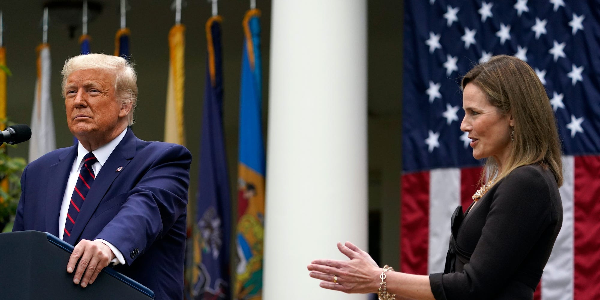 Judge Amy Coney Barrett applauds as President Donald Trump announces Barrett as his nominee to the Supreme Court, in the Rose Garden at the White House, Saturday, Sept. 26, 2020, in Washington.