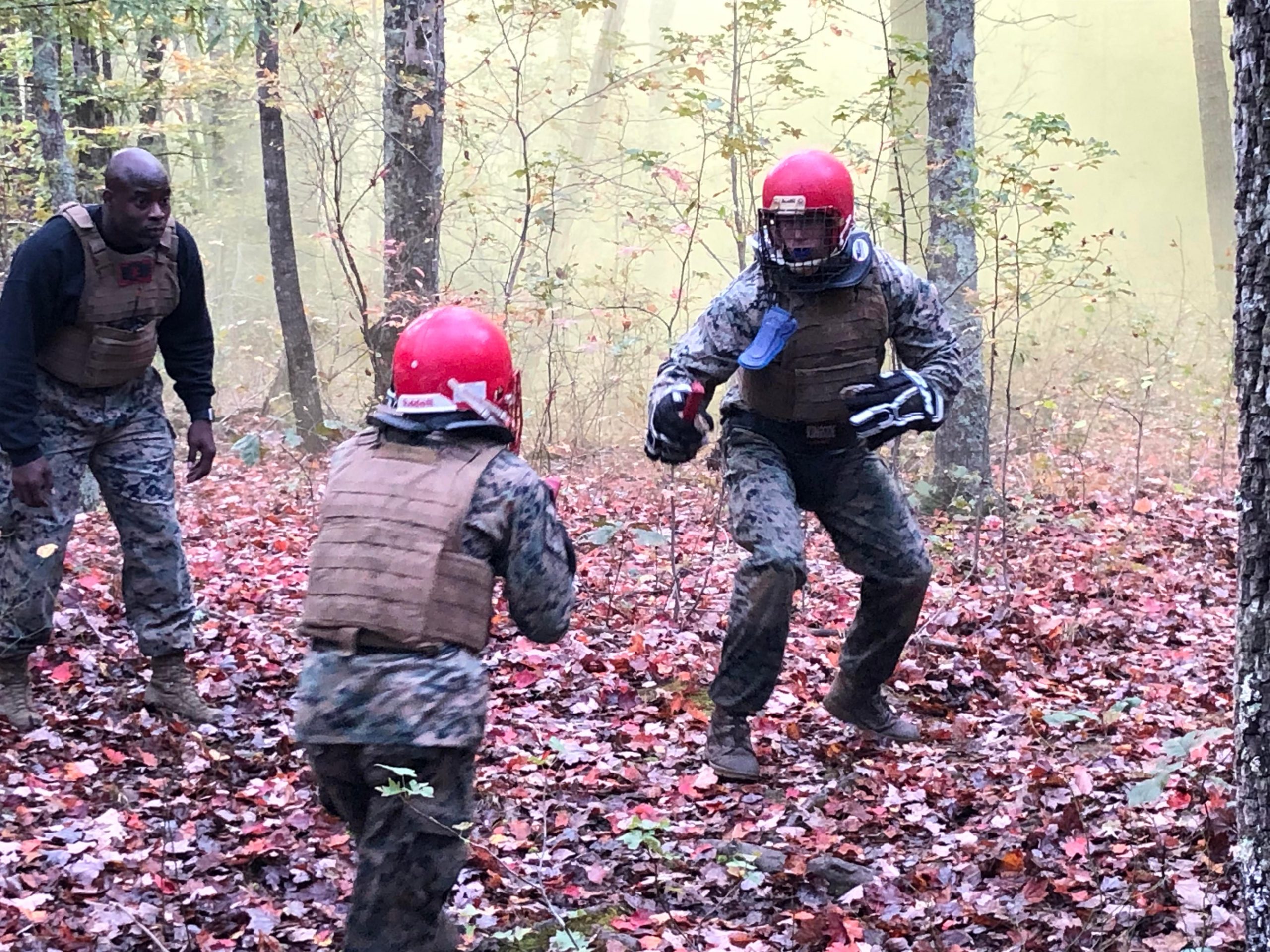 Two Marines spar with training knives