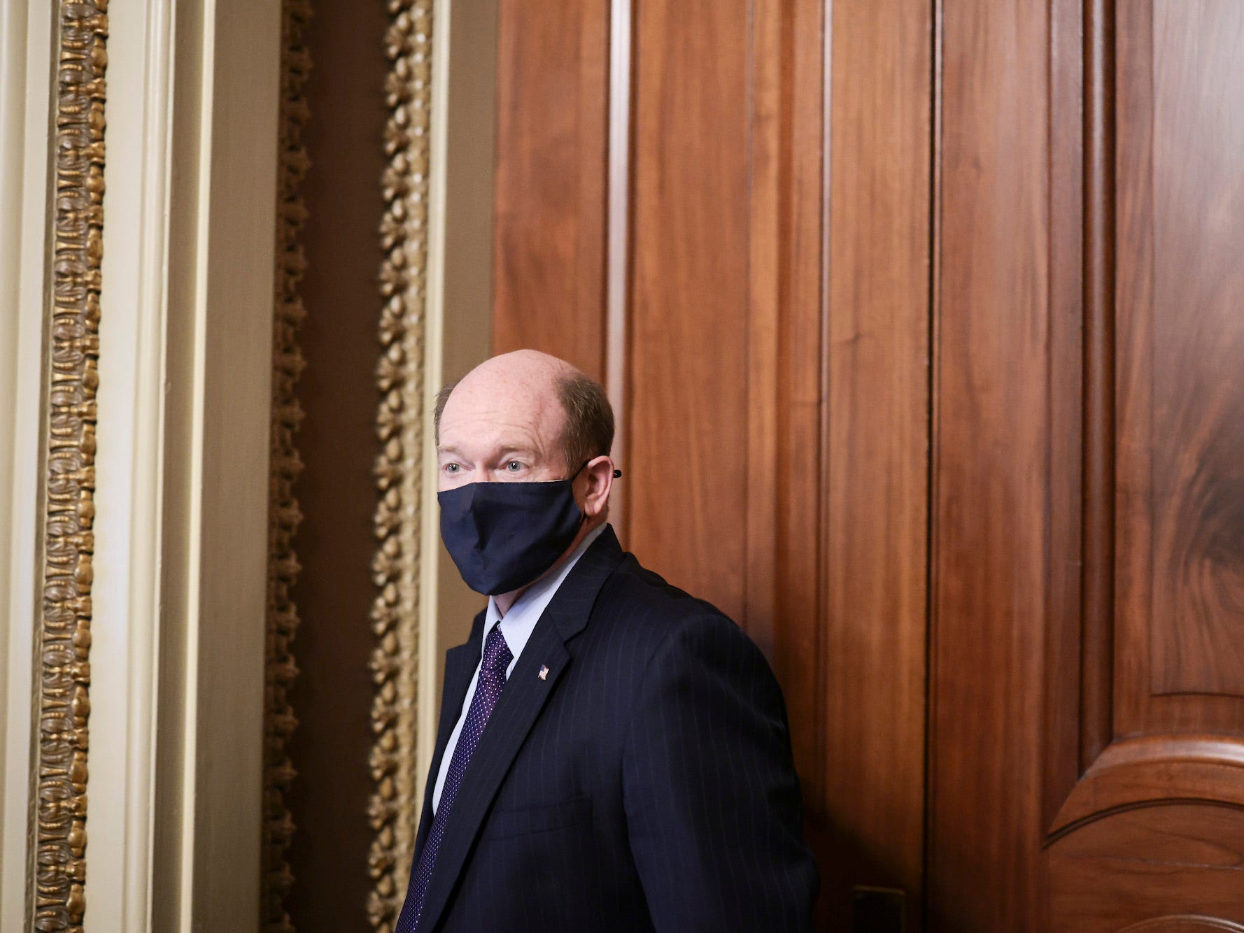 Sen. Chris Coons (D-DE) departs from a caucus meeting with Democratic Senators after a procedural vote on the debt limit was postponed at the U.S. Capitol Building on October 06, 2021 in Washington, DC. Congress has until October 18 to raise the debt ceiling or risk a default that would have widespread economic consequences. (Photo by Anna Moneymaker/Getty Images)