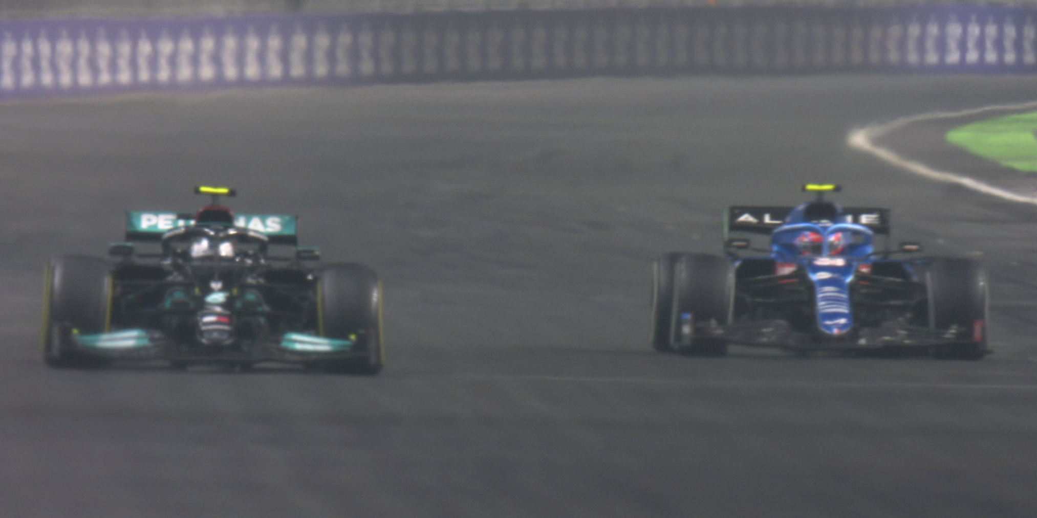 Alpine's Esteban Ocon is beaten by Mercedes driver Valtteri Bottas at the Saudi Arabian Grand Prix