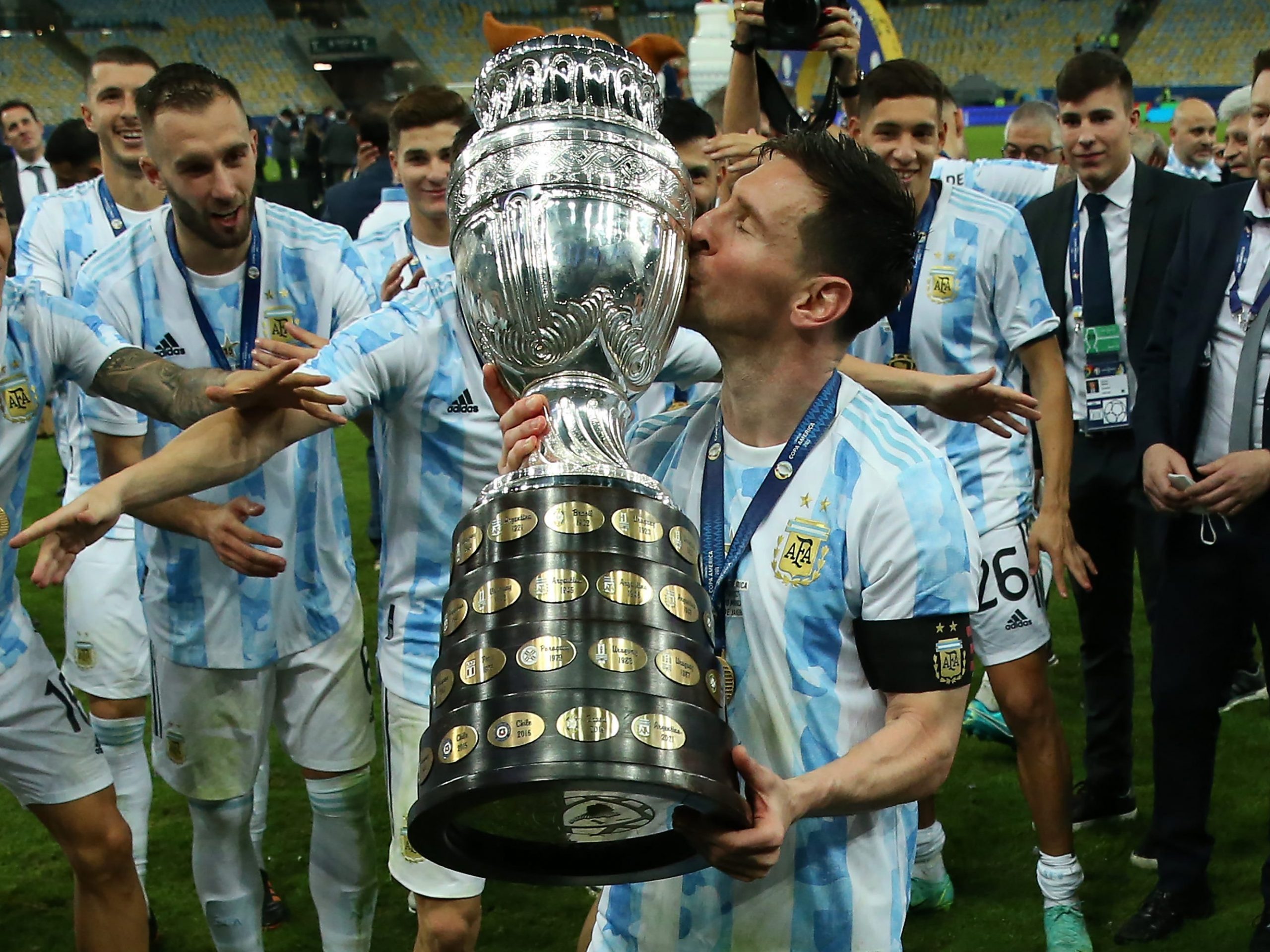 Lionel Messi kisses the Copa America.