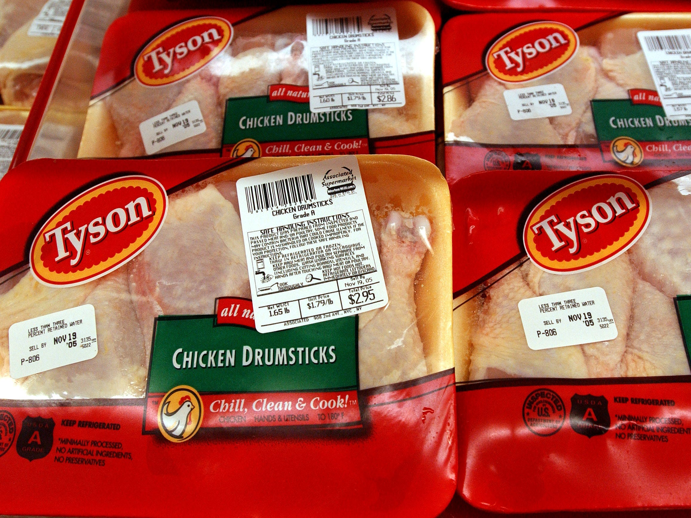 Packages of Tyson-brand chicken products are displayed in the refrigerator section of an Associated Supermarket.