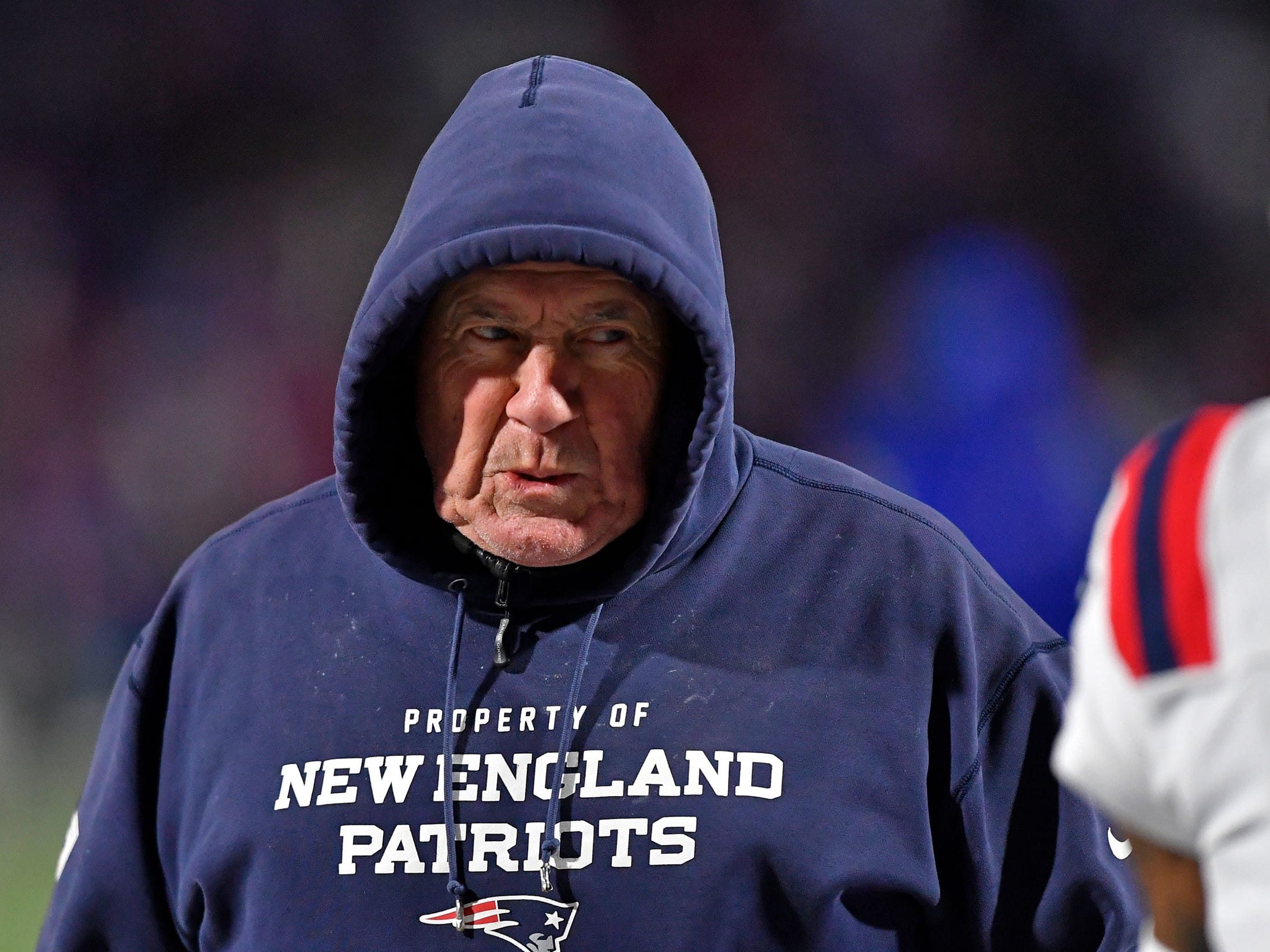 Bill Belichick walks on the sideline during a game against the Buffalo Bills.