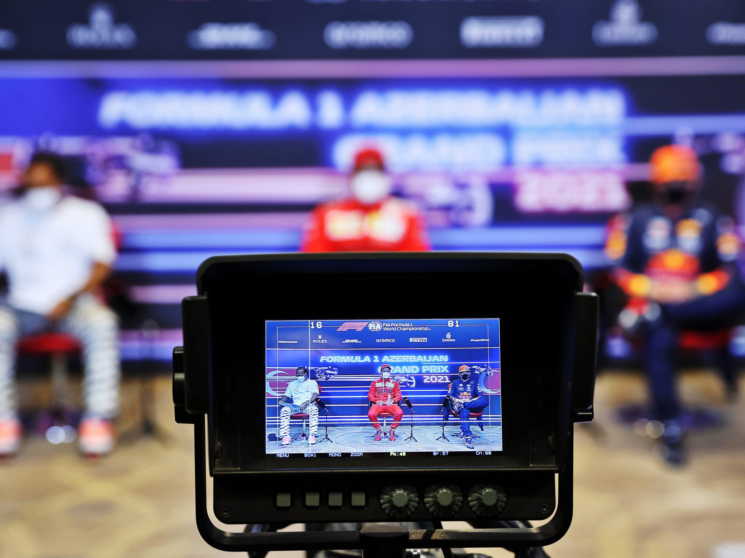 A TV camera looks at F1 drivers.