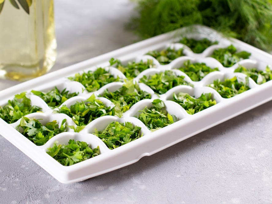 Frozen herbs in an ice cube for cooking.