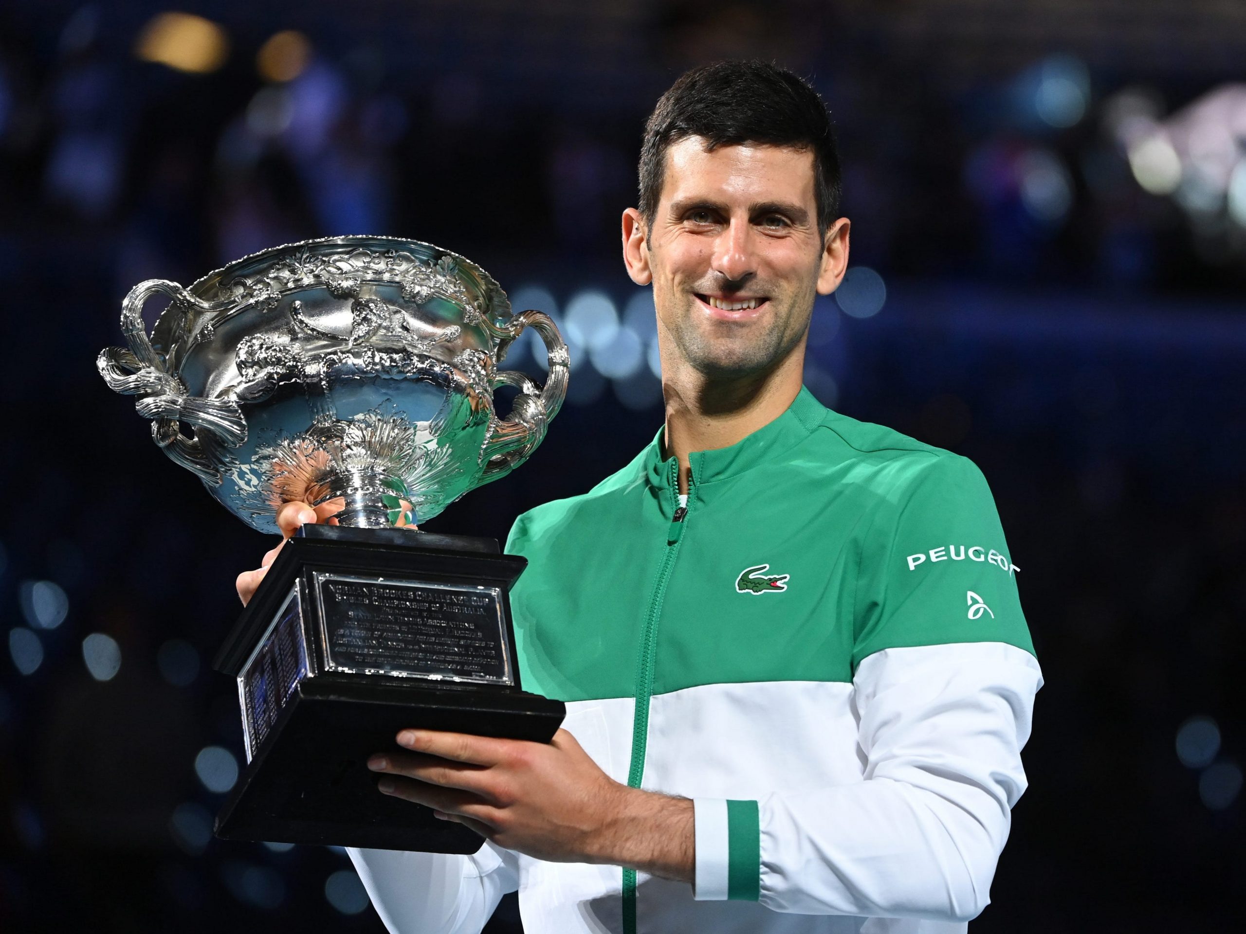 Novak Djokovic with the Australian Open trophy.