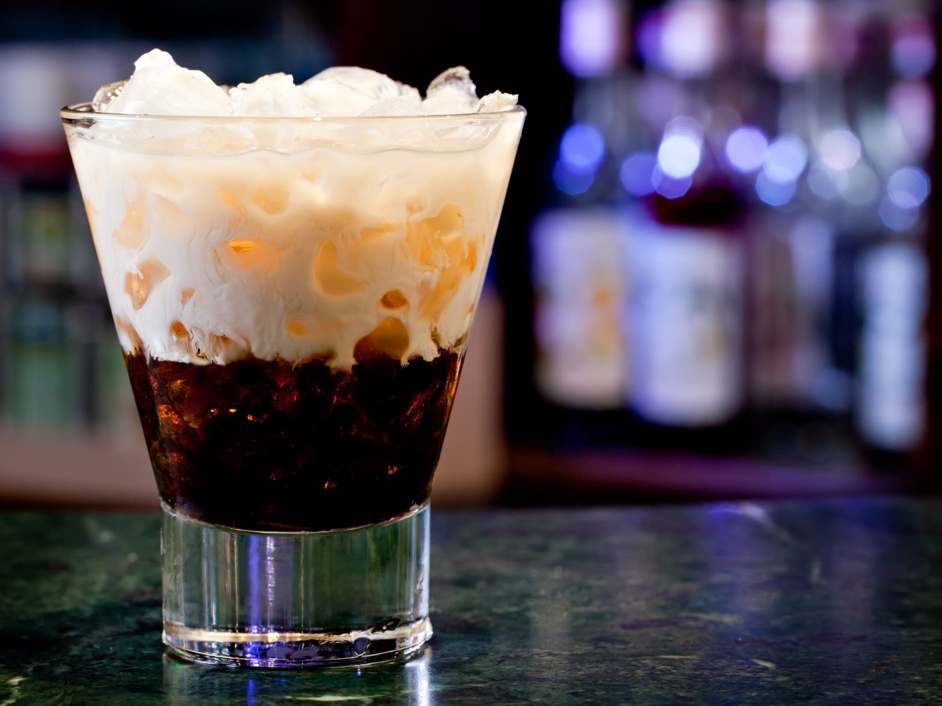 A white Russian cocktail on a bar