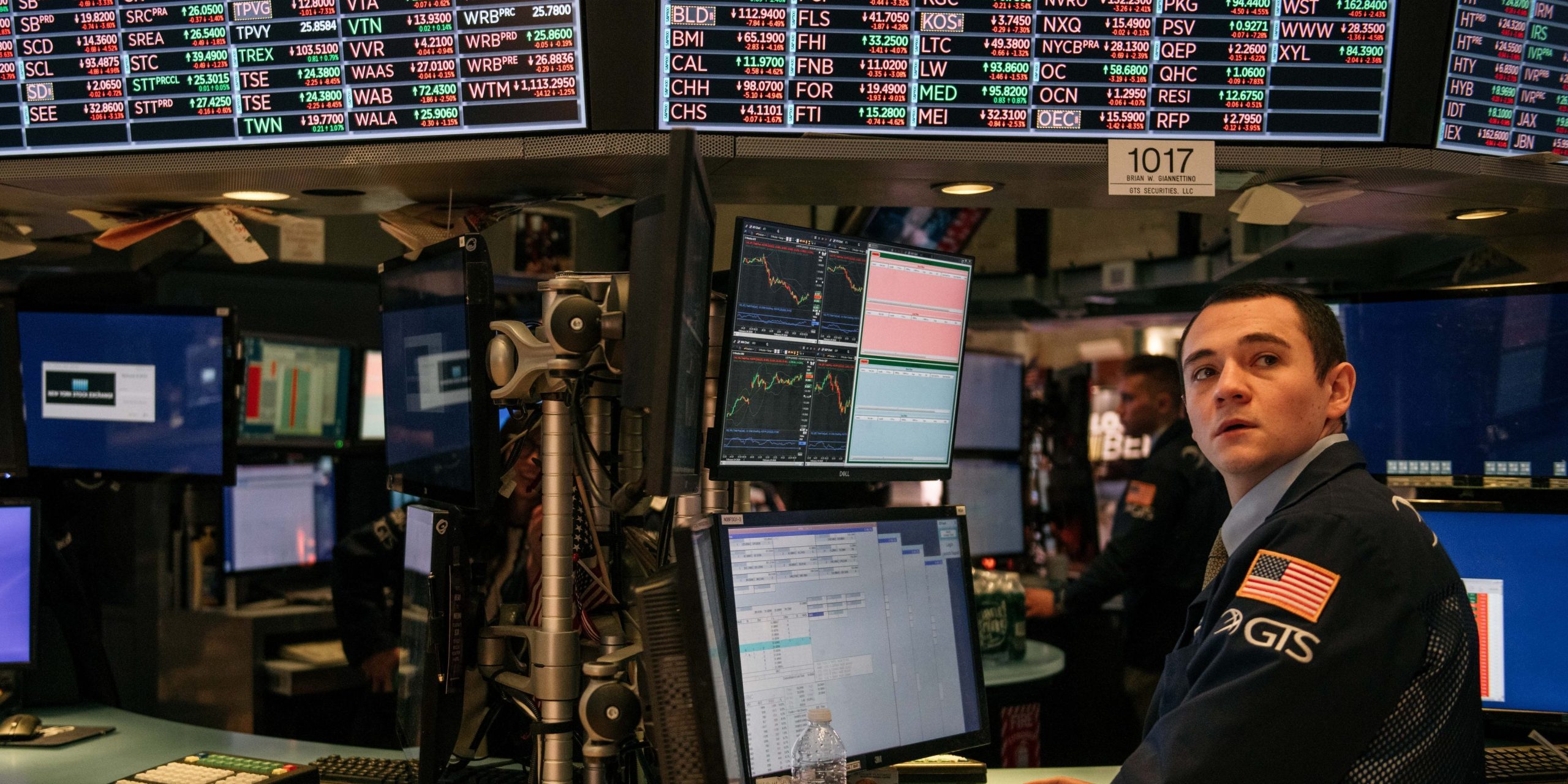 Traders work through the closing minutes of trading Tuesday on the New York Stock Exchange floor on February 25, 2020 in New York City.