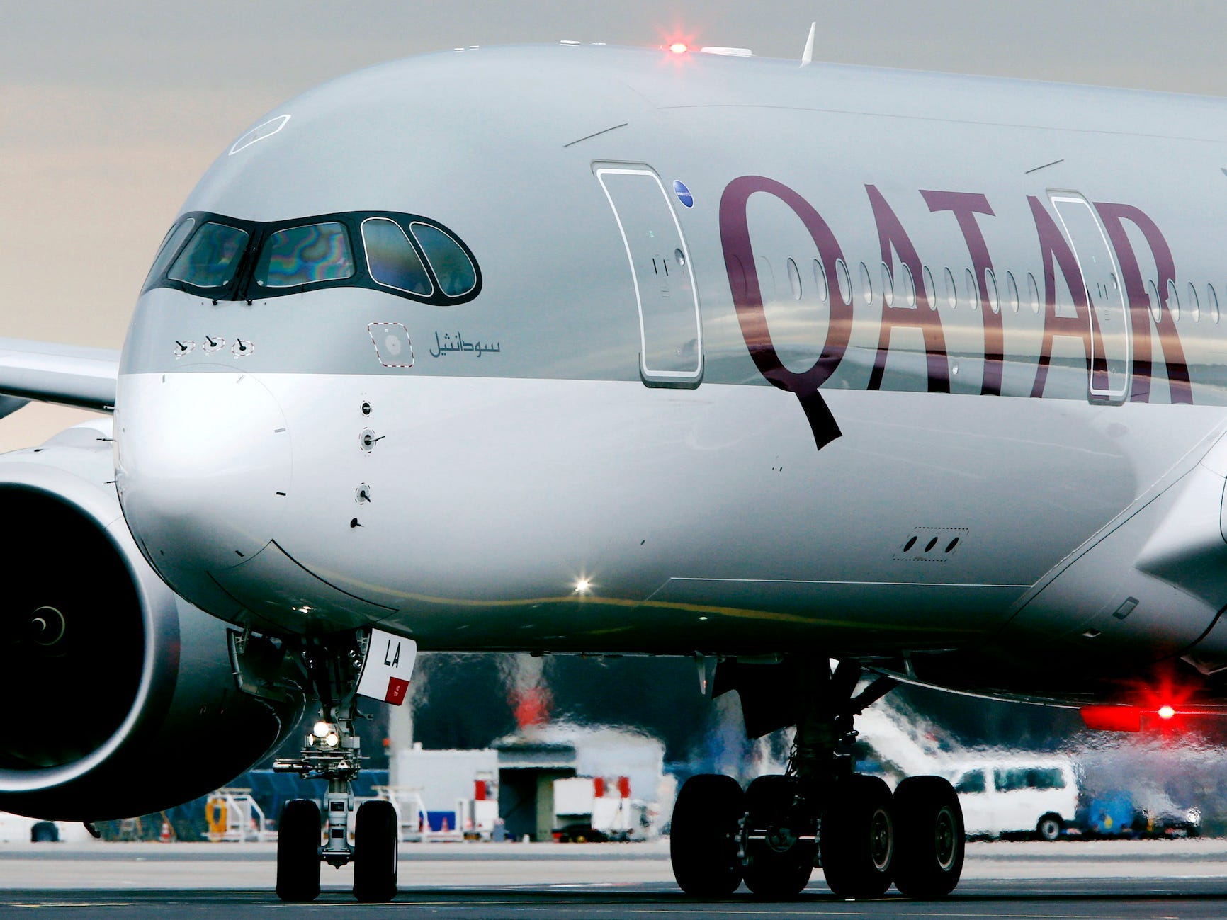 The front of a Qatar Airways plane.