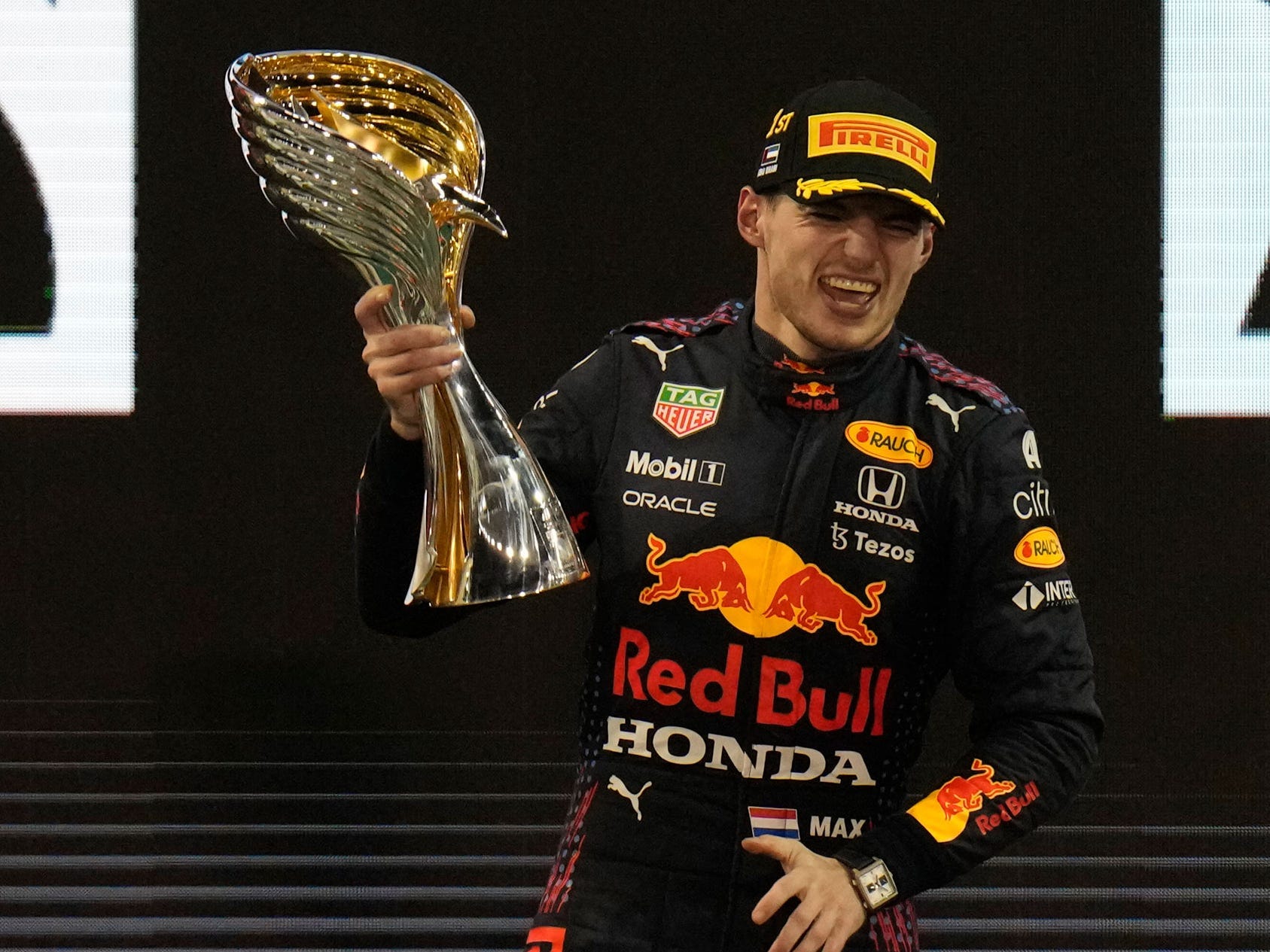 Max Verstappen celebrates after winning the Abu Dhabi Grand Prix.