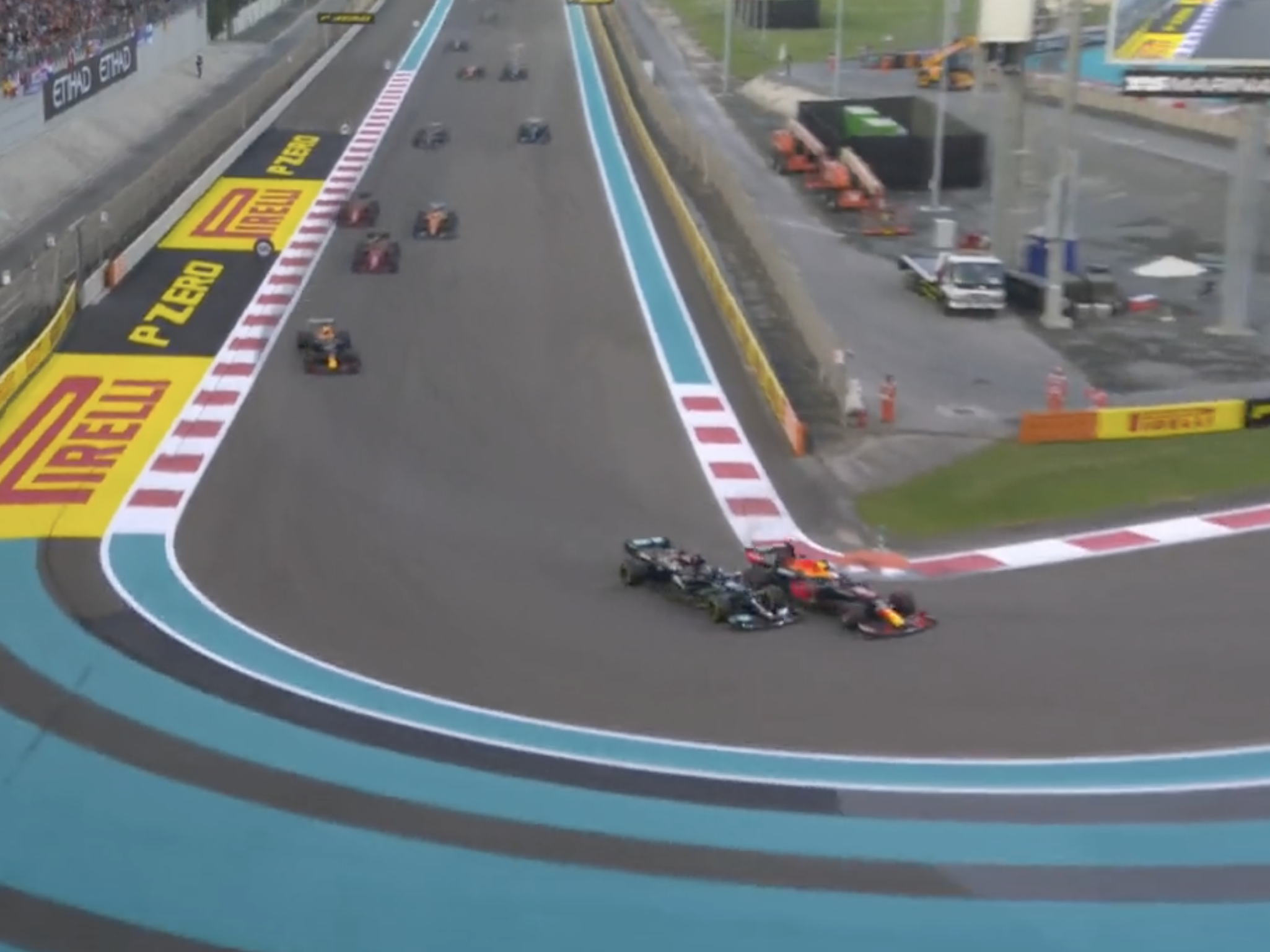 Lewis Hamilton and Max Verstappen clash during the title-deciding Abu Dhabi Grand Prix on December 12, 2021.