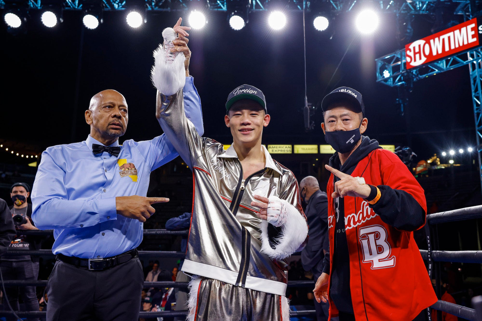 Brandun Lee celebrates with his father and trainer Bobby Lee.