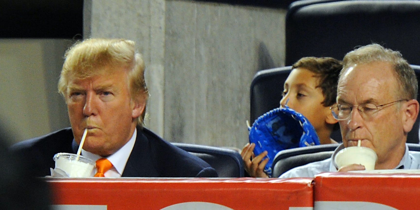 Donald Trump and Bill O'Reilly sip from milkshakes at a New York Yankees game in 2010.