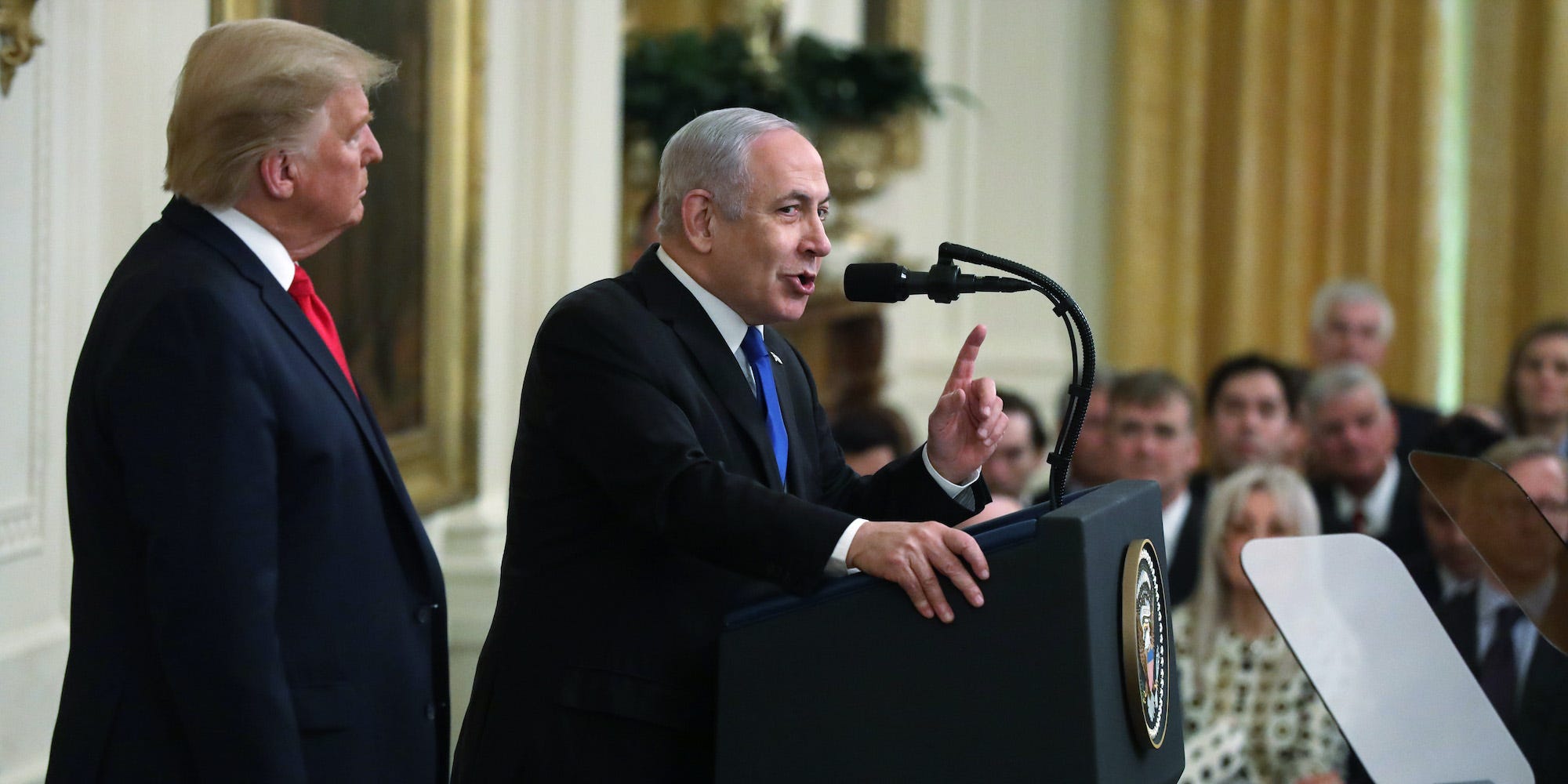 Israeli Prime Minister Benjamin Netanyahu (C) speaks during a press conference with U.S. President Donald Trump in the East Room of the White House on January 28, 2020 in Washington, DC.