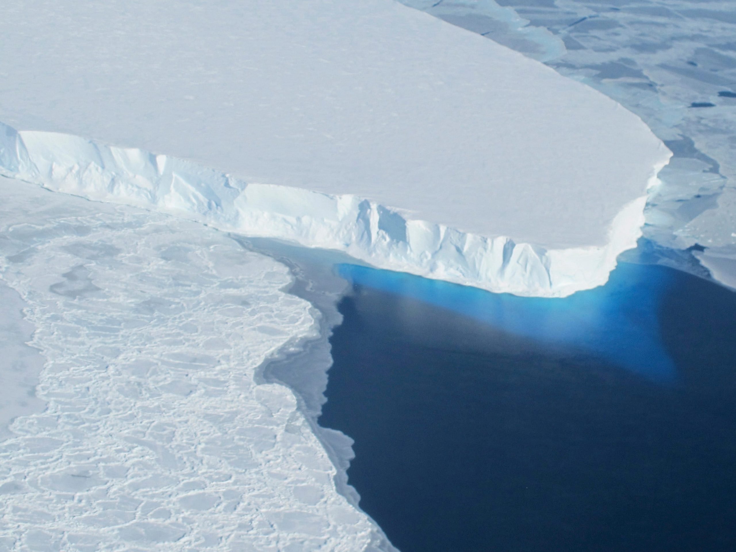 thwaites glacier in blue ocean waters antarctica