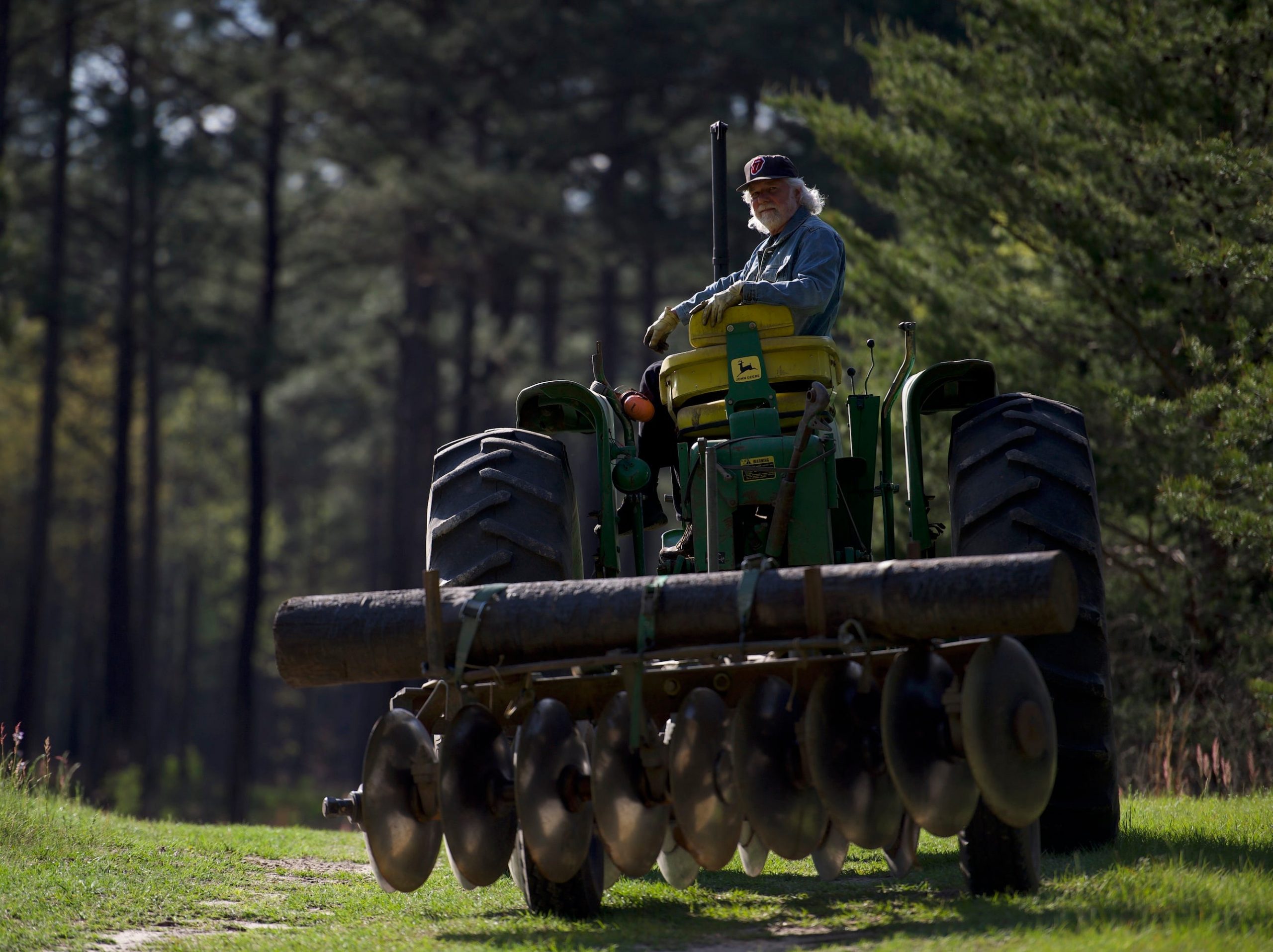 Chuck Leavell at home on a tractor, courtesy of Allen Farst