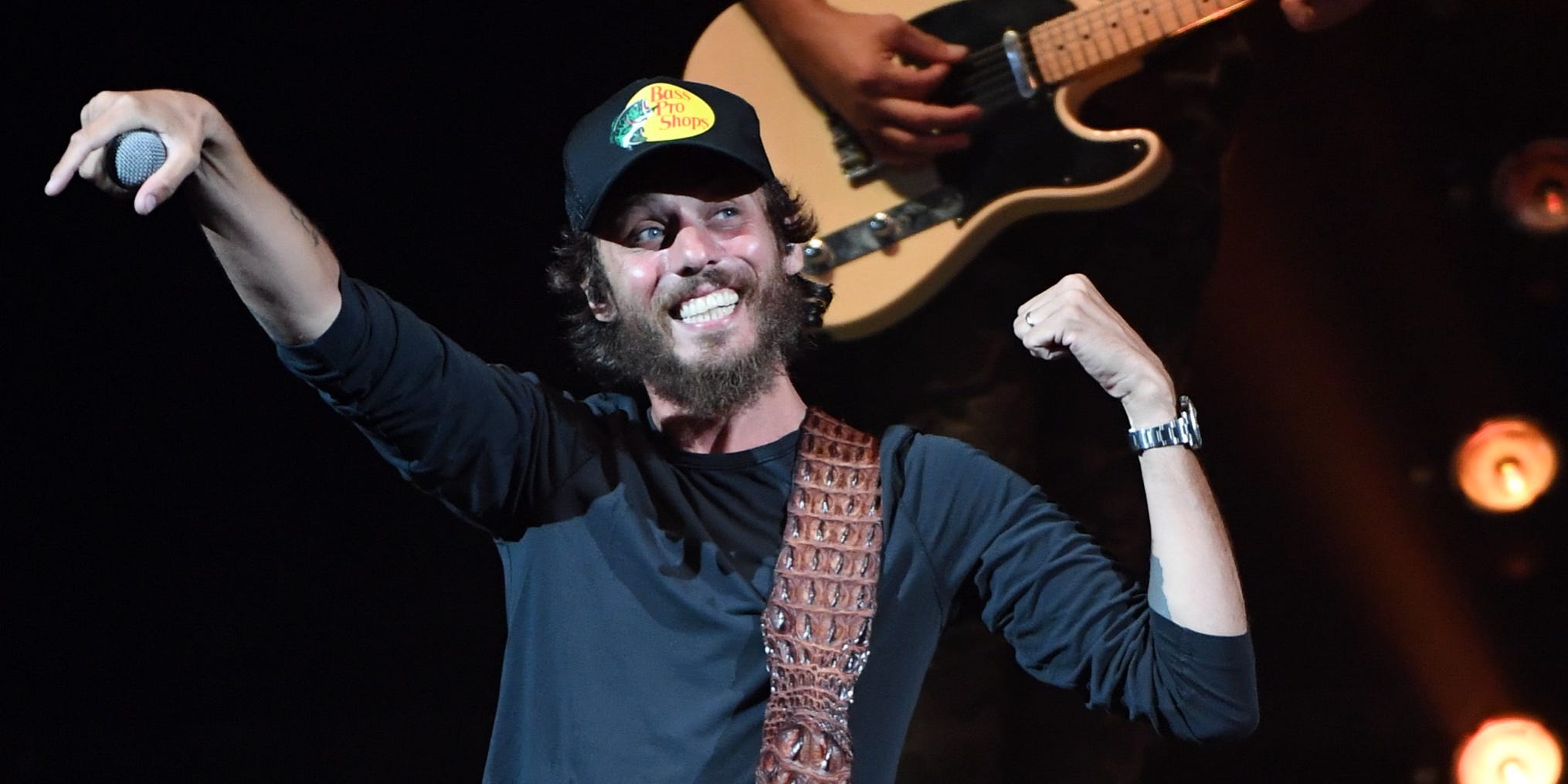 Country musician Chris Janson performs in Las Vegas wearing a Bass Pro Shops truckers hat
