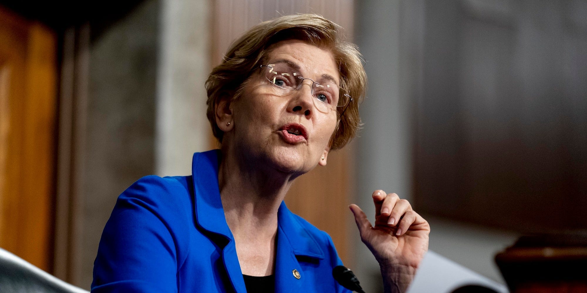 Sen. Elizabeth Warren, D-Mass., speaks as Treasury Secretary Janet Yellen and Federal Reserve Chairman Jerome Powell testify during a Senate Banking Committee hearing on Capitol Hill in Washington, Tuesday, Nov. 30, 2021