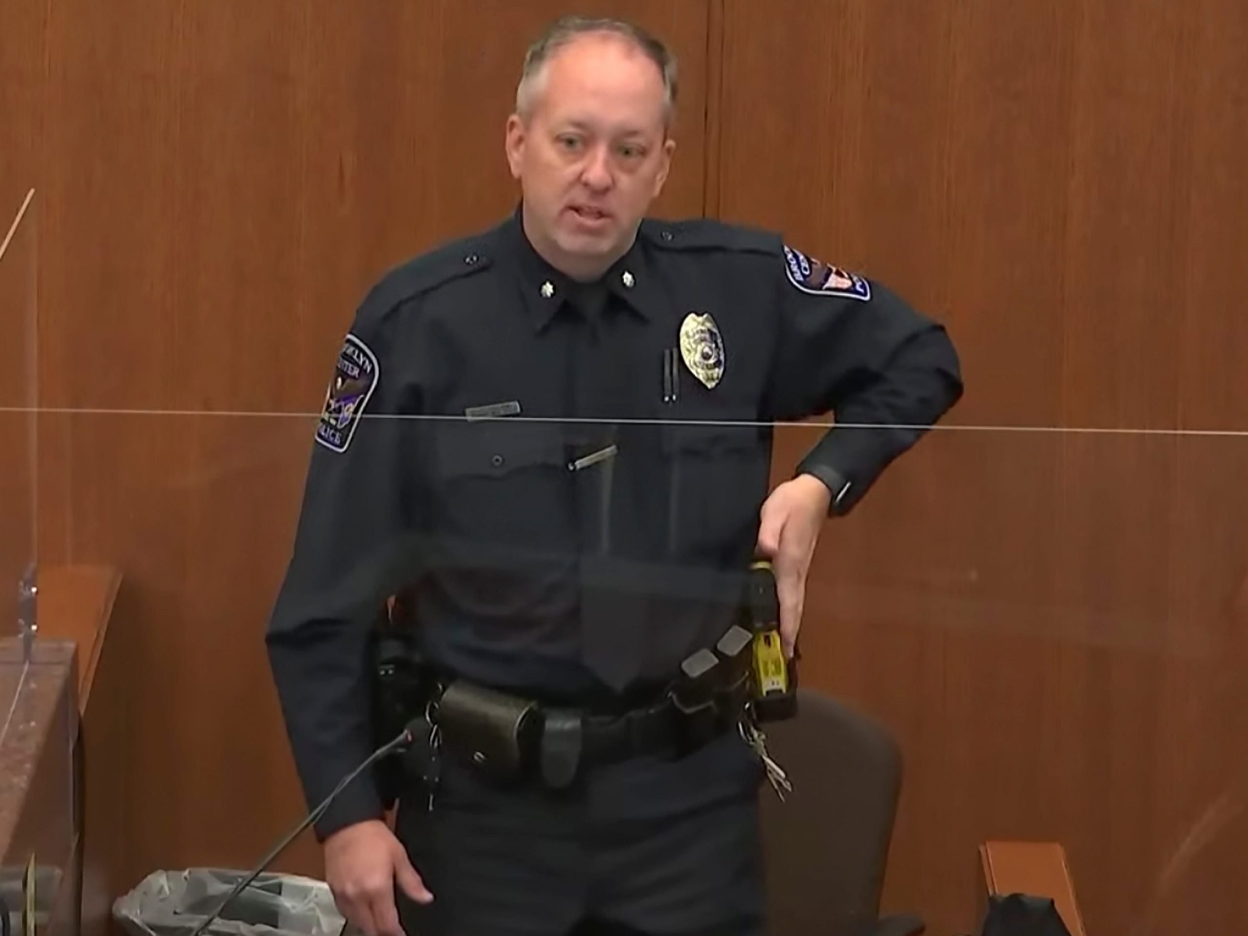 In this screen grab from video, Brooklyn Center police Commander Garett Flesland testifies as Hennepin County Judge Regina Chu presides over court Tuesday, Dec. 14, 2021, in the trial of former Brooklyn Center police Officer Kim Potter in the April 11, 2021, death of Daunte Wright, at the Hennepin County Courthouse in Minneapolis, Minn.