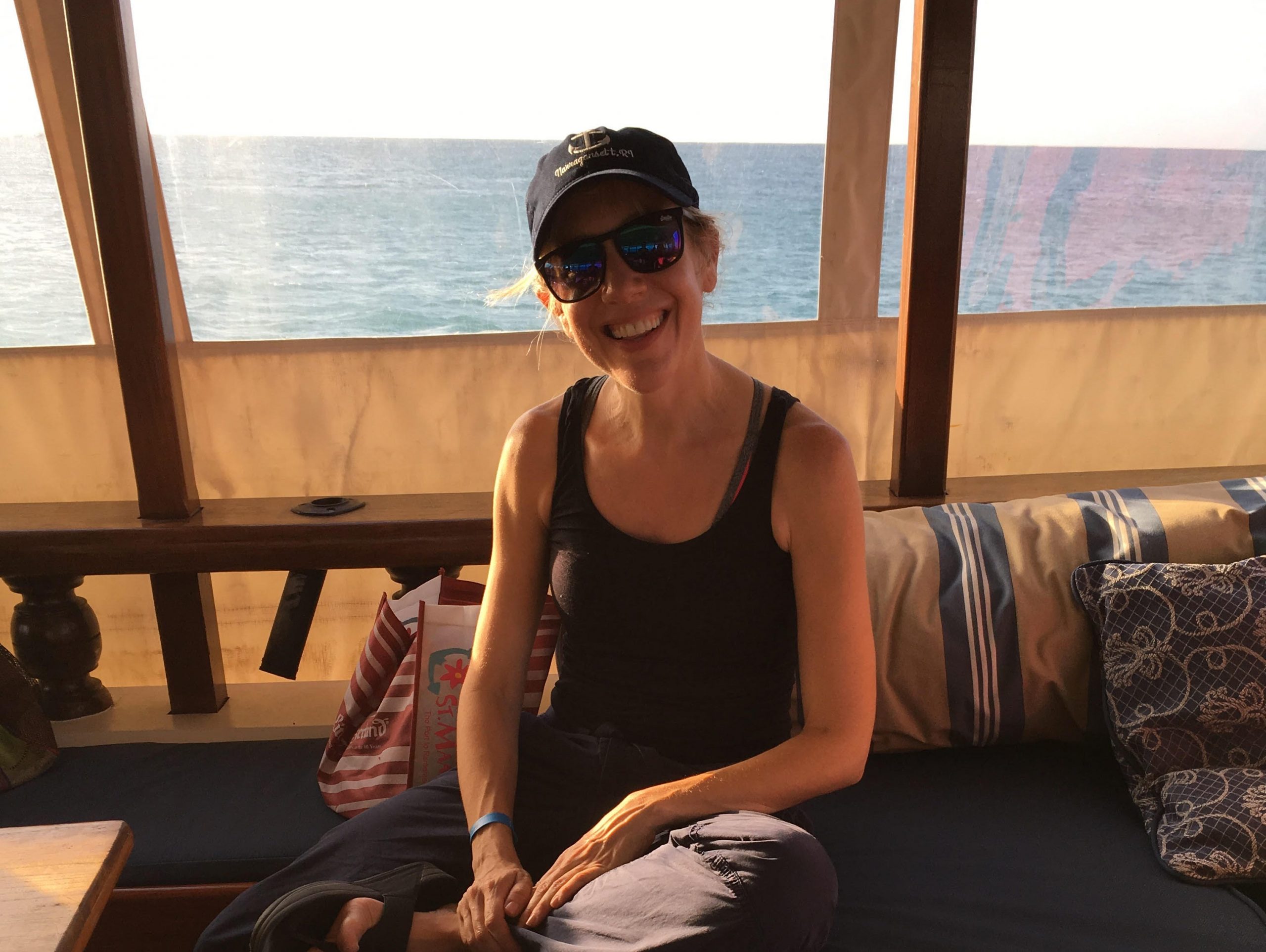 Sarah DiMuro sitting by the ocean