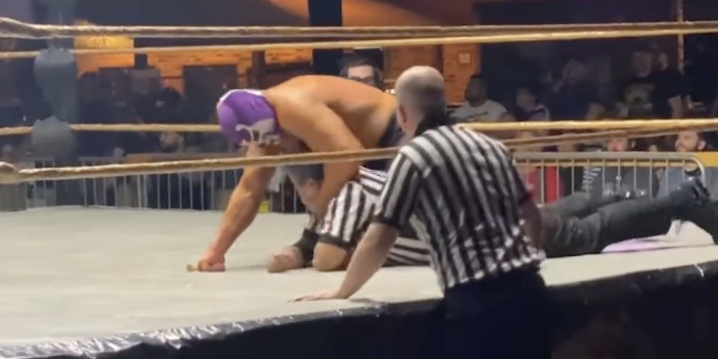Wrestler Devon Nicholson attacks the referee in an incident at a Texas wrestling show