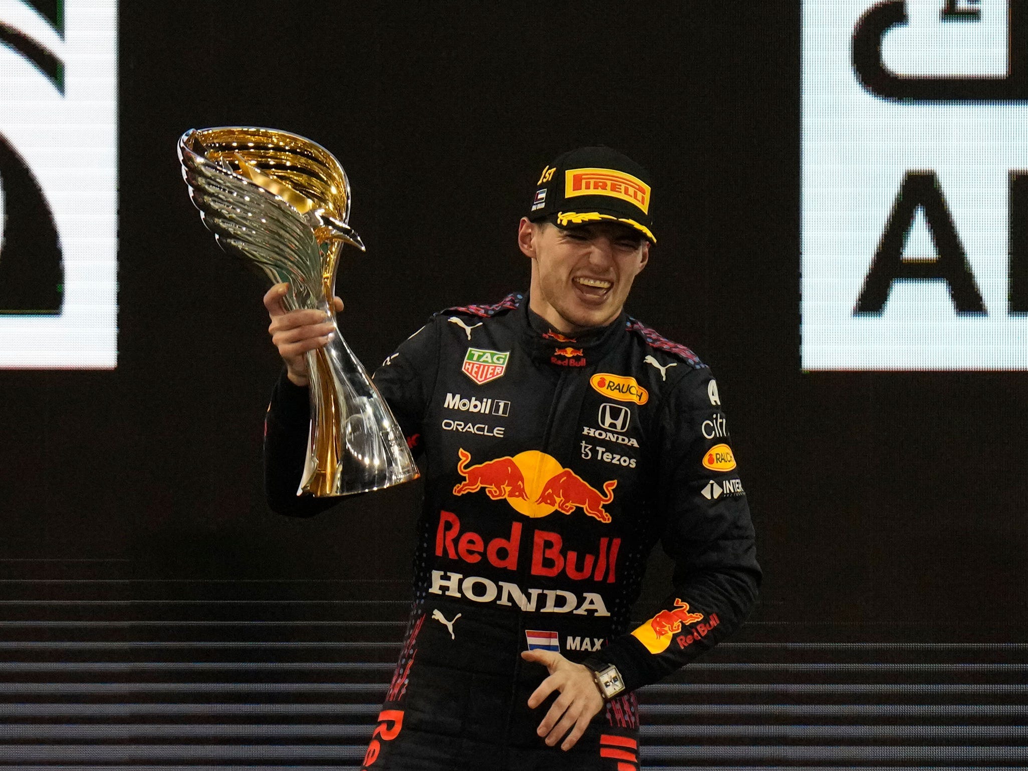 Max Verstappen celebrates after winning the Abu Dhabi Grand Prix.