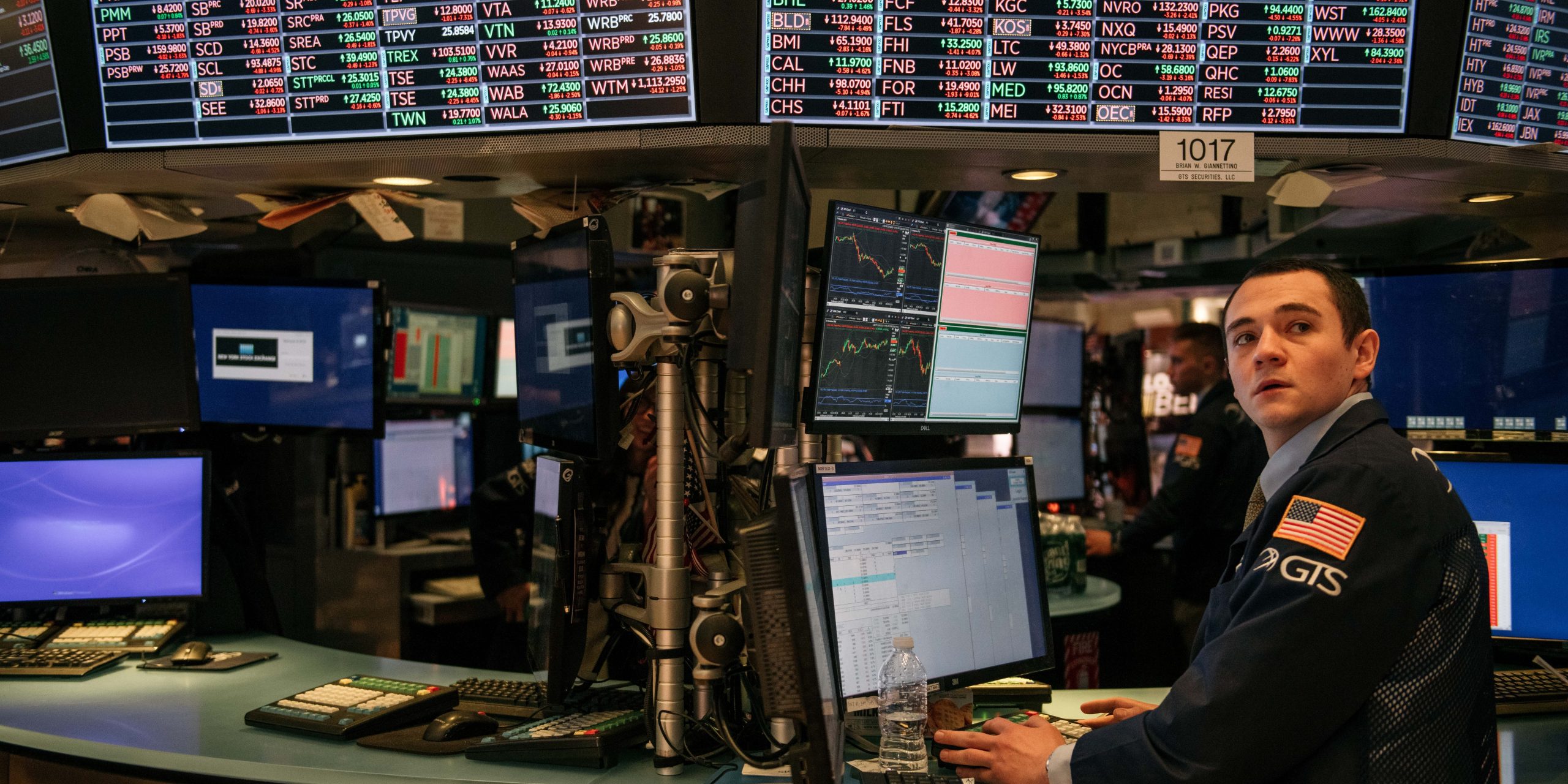 Traders work through the closing minutes of trading Tuesday on the New York Stock Exchange floor on February 25, 2020 in New York City.