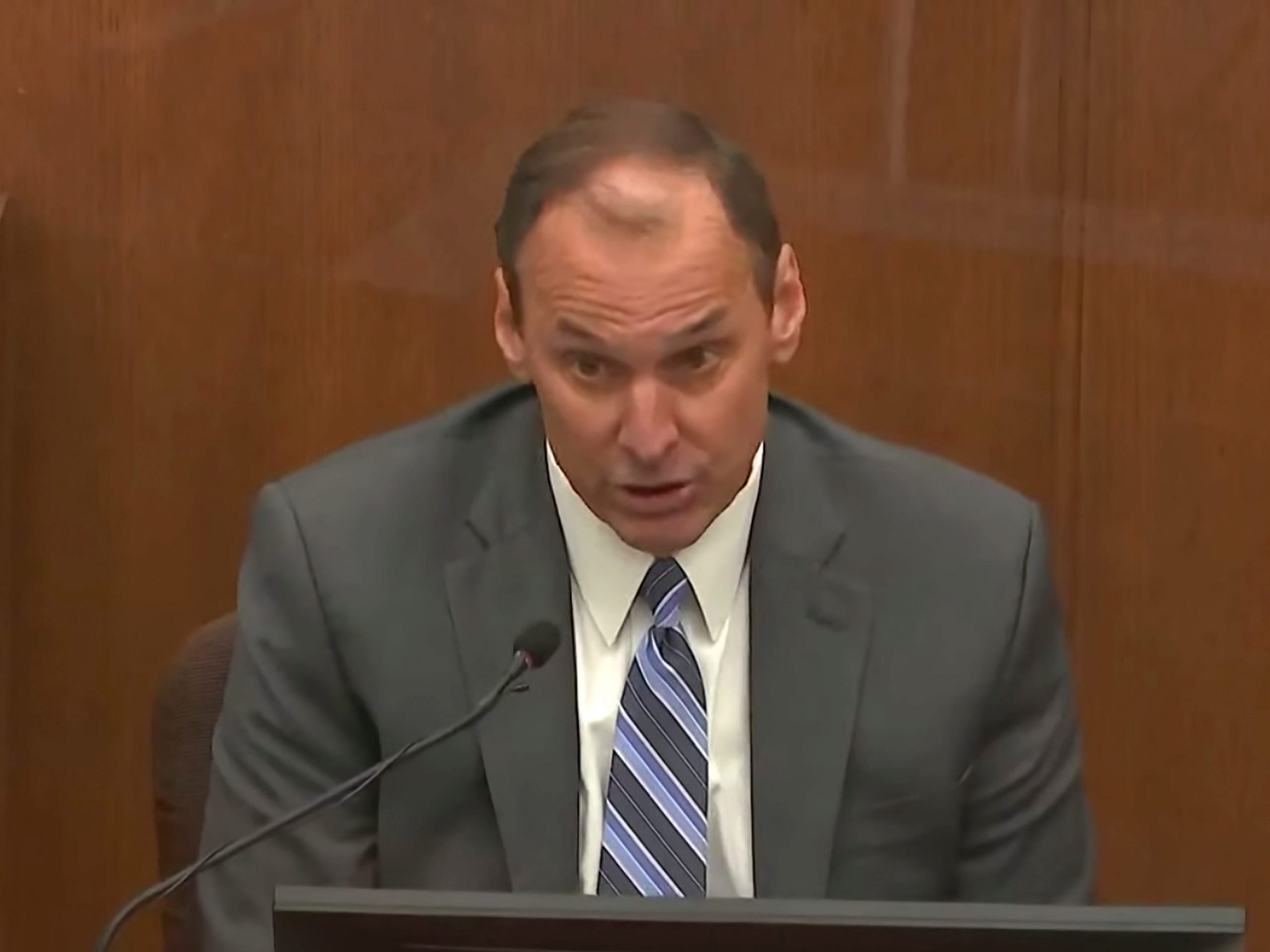 In this screen grab from video, Stephen Ijames, a use-of-force expert and former assistant police chief for Springfield, Missouri, testifies as Hennepin County Judge Regina Chu presides over court Thursday Dec.16, 2021, in the trial of former Brooklyn Center police Officer Kim Potter in the April 11, 2021, death of Daunte Wright, at the Hennepin County Courthouse in Minneapolis, Minn