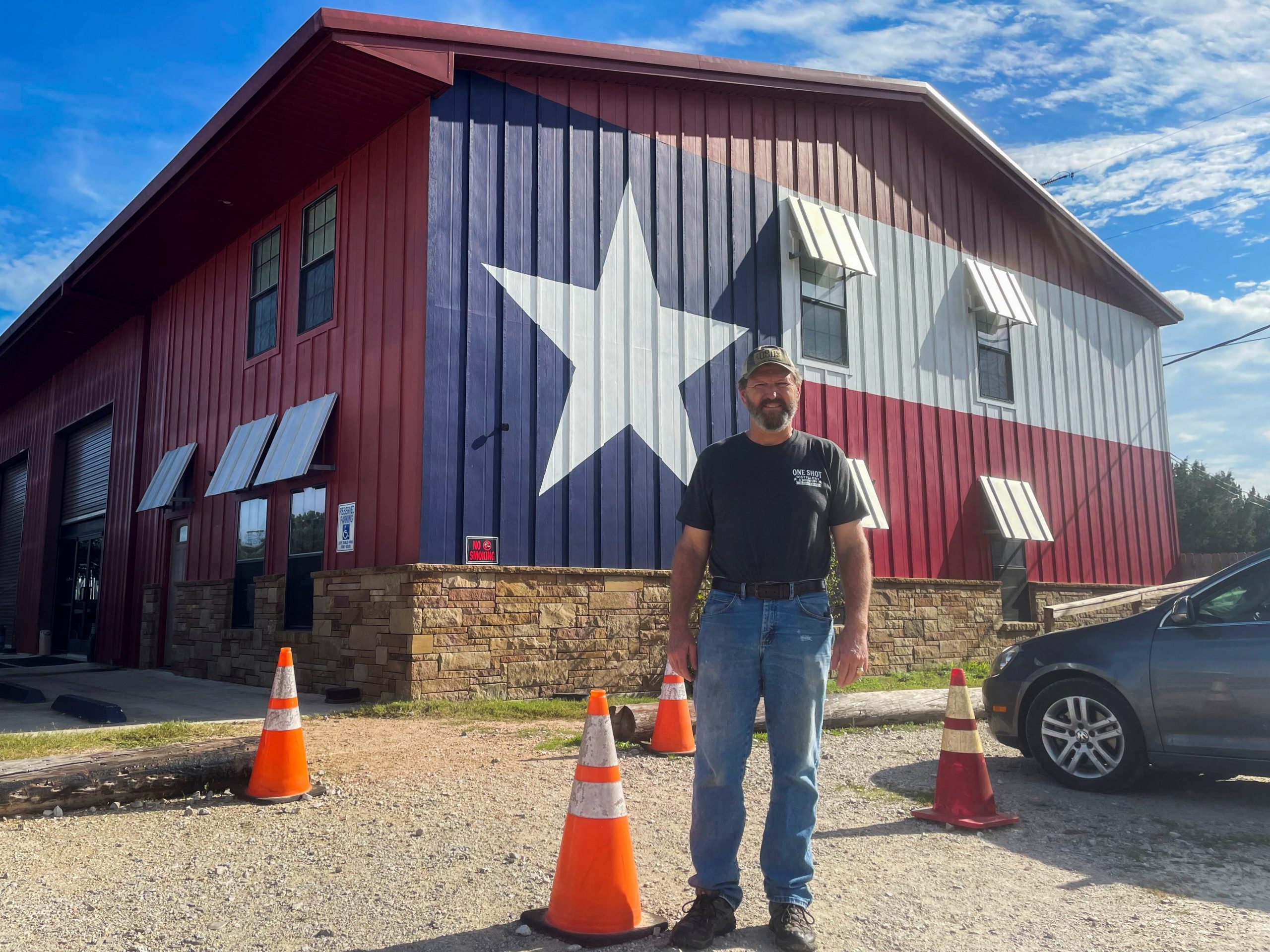 Retired Colonel in the Army Reserves, Phil Waldron, poses for a photo at his distillery, One Shot Distillery and Brewery, in Dripping Springs, Texas, U.S., December 2, 2021.
