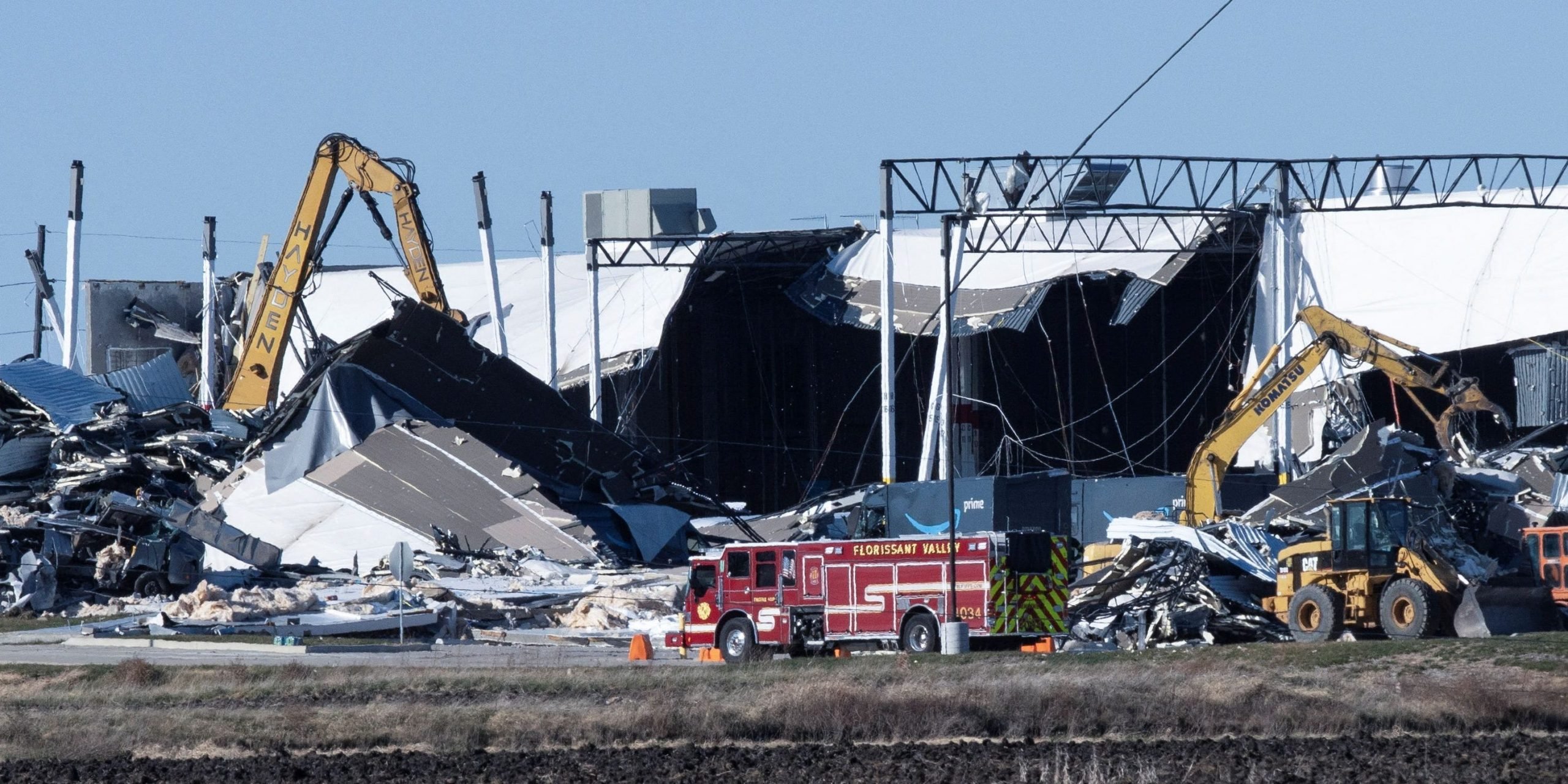 Construction crews work at the site of a roof collapse at an Amazon distribution center in Edwardsville, Illinois, US December 11, 2021.