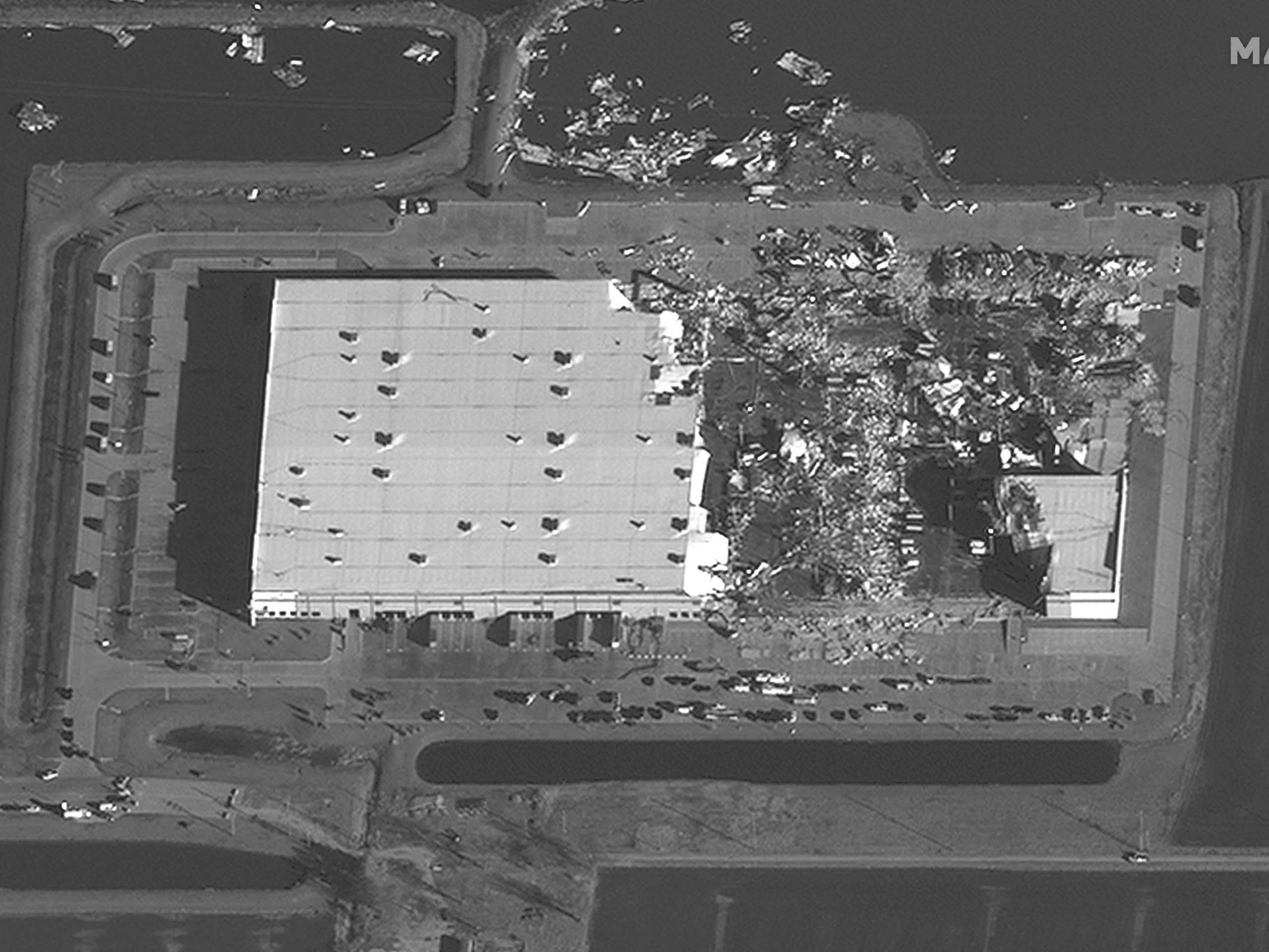 A satellite image shows the aftermath of a tornado in Edwardsville, Illinois, which destroyed hundred of yards of an Amazon facility, killing at least six people.