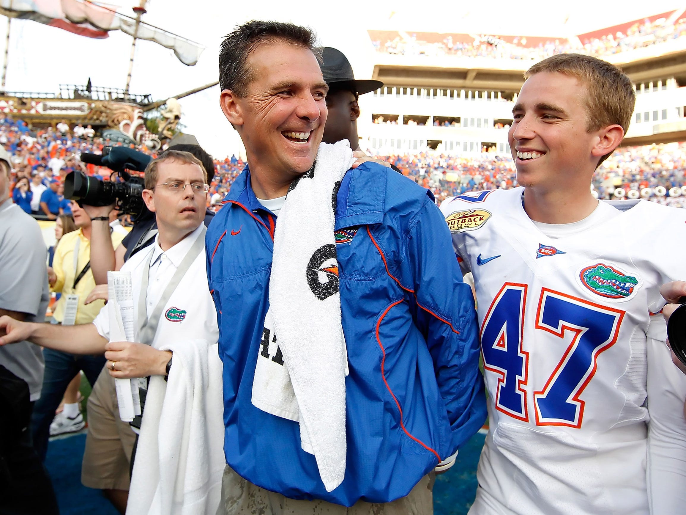 Florida head coach Urban Meyer smiles after win over Penn State in 2011 Outback Bowl.