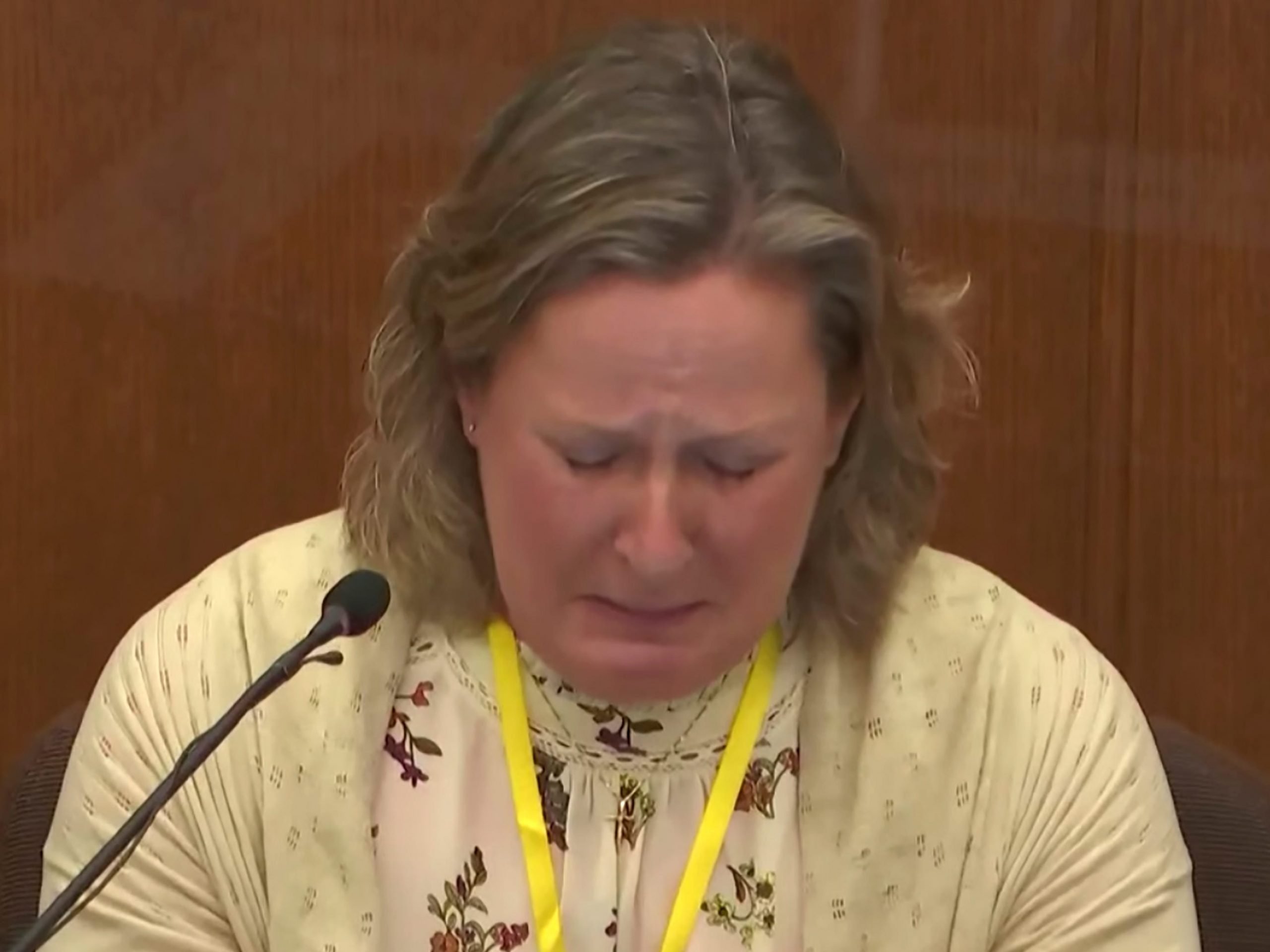 In this screen grab from video, former Minnesota police officer Kim Potter breaks down while testifying at her trial on manslaughter charges on Friday, Dec. 17, 2021.