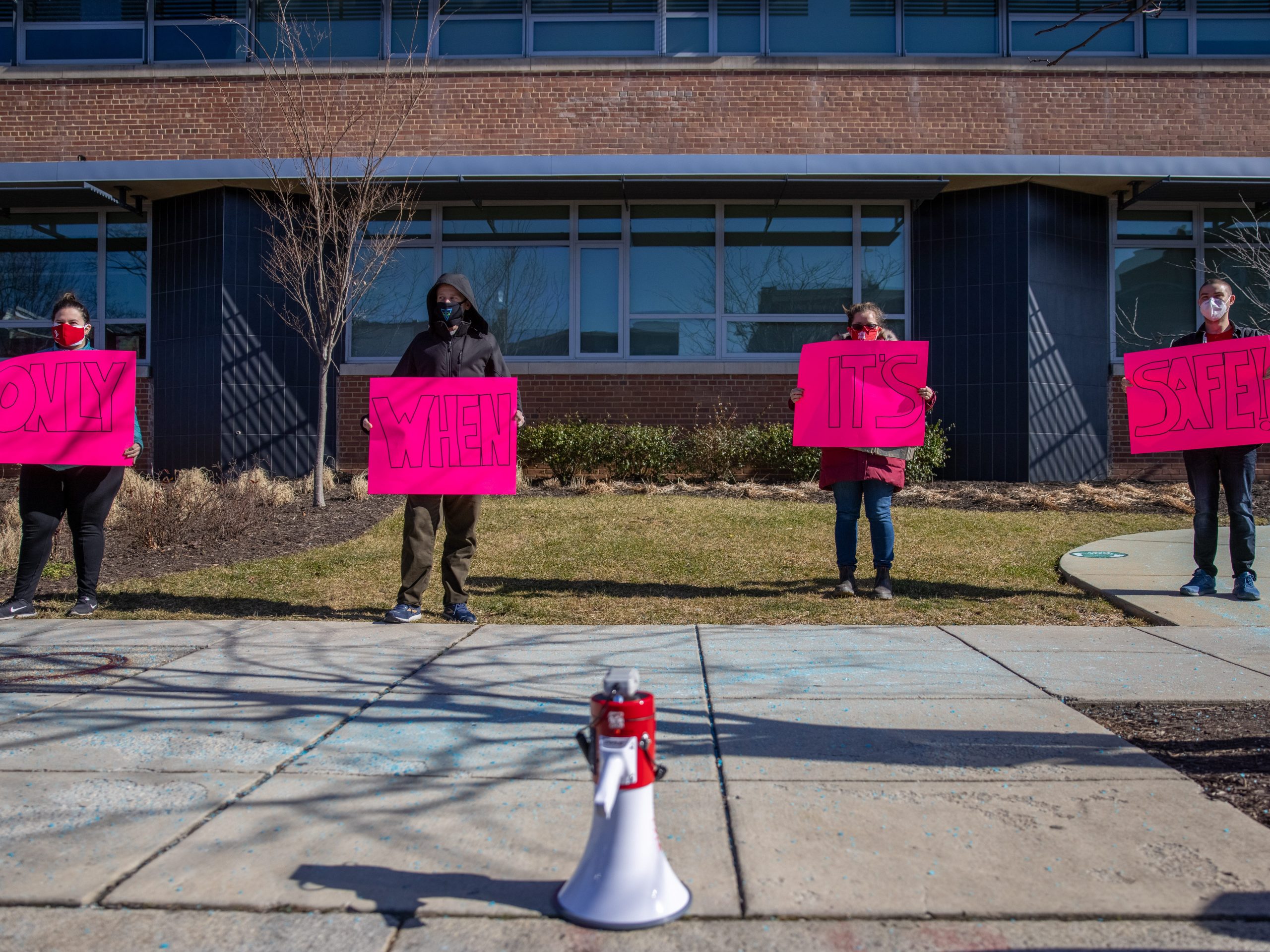 DC public school teachers outside Watkins Elementary School in Southeast, Washington, DC, during a protest against school reopening, January 30, 2021.