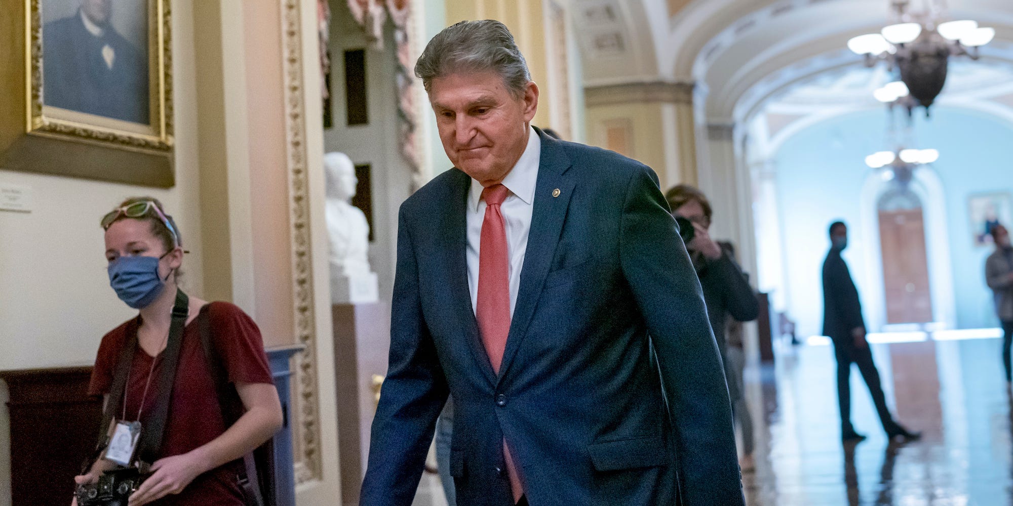 Sen. Joe Manchin, D-W.Va., walks to a caucus lunch at the Capitol in Washington, Dec. 17, 2021. Manchin said Sunday, Dec. 19, 2021 he cannot back a $2 trillion social safety net bill, dealing a potentially fatal blow to President Joe Biden’s signature legislation