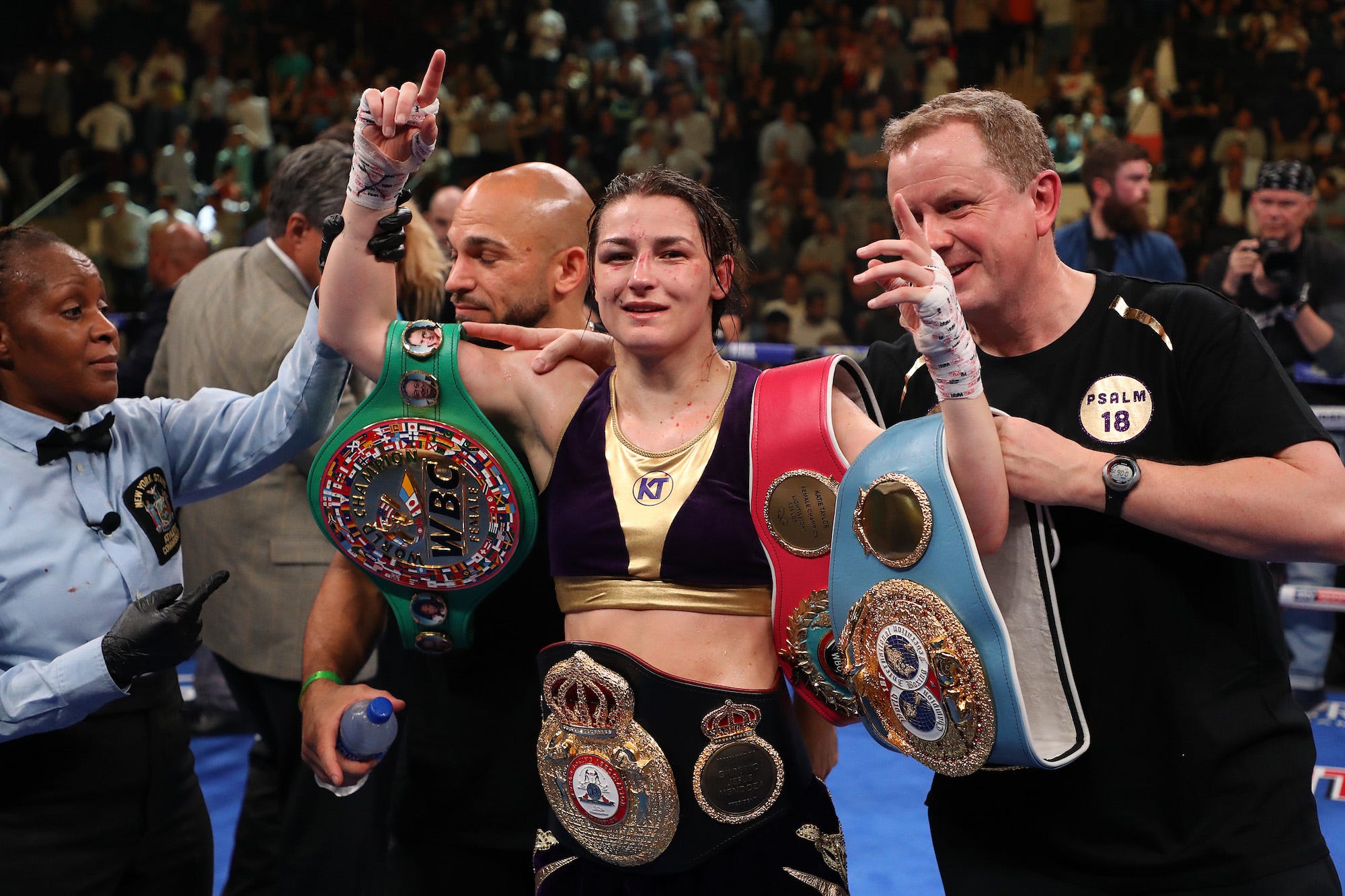 Katie Taylor reacts after a majority decision win against Delfine Persoon during their WBA/WBO/IBF/WBC women's lightweight unification fight at Madison Square Garden