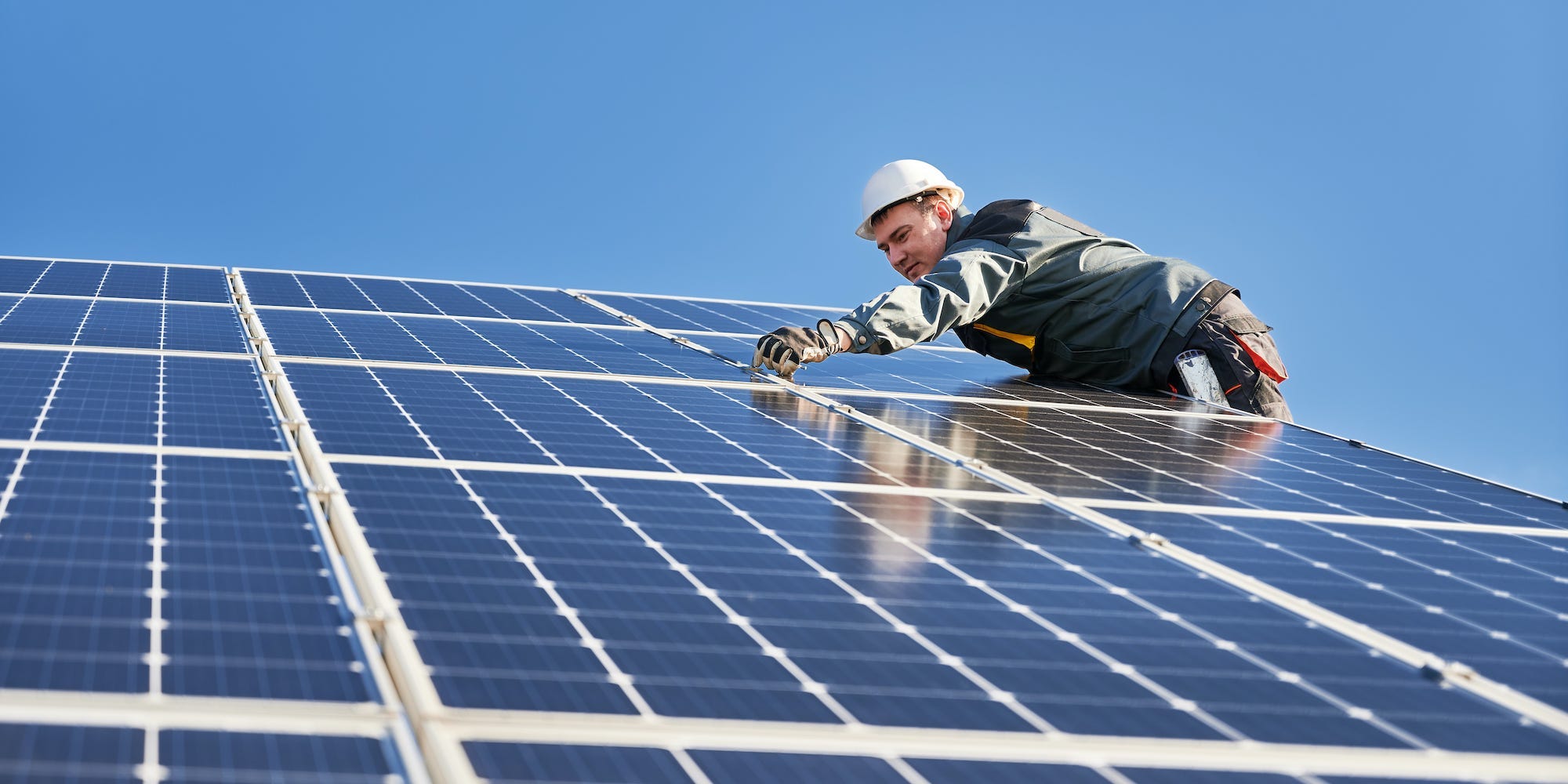 Solar installer working