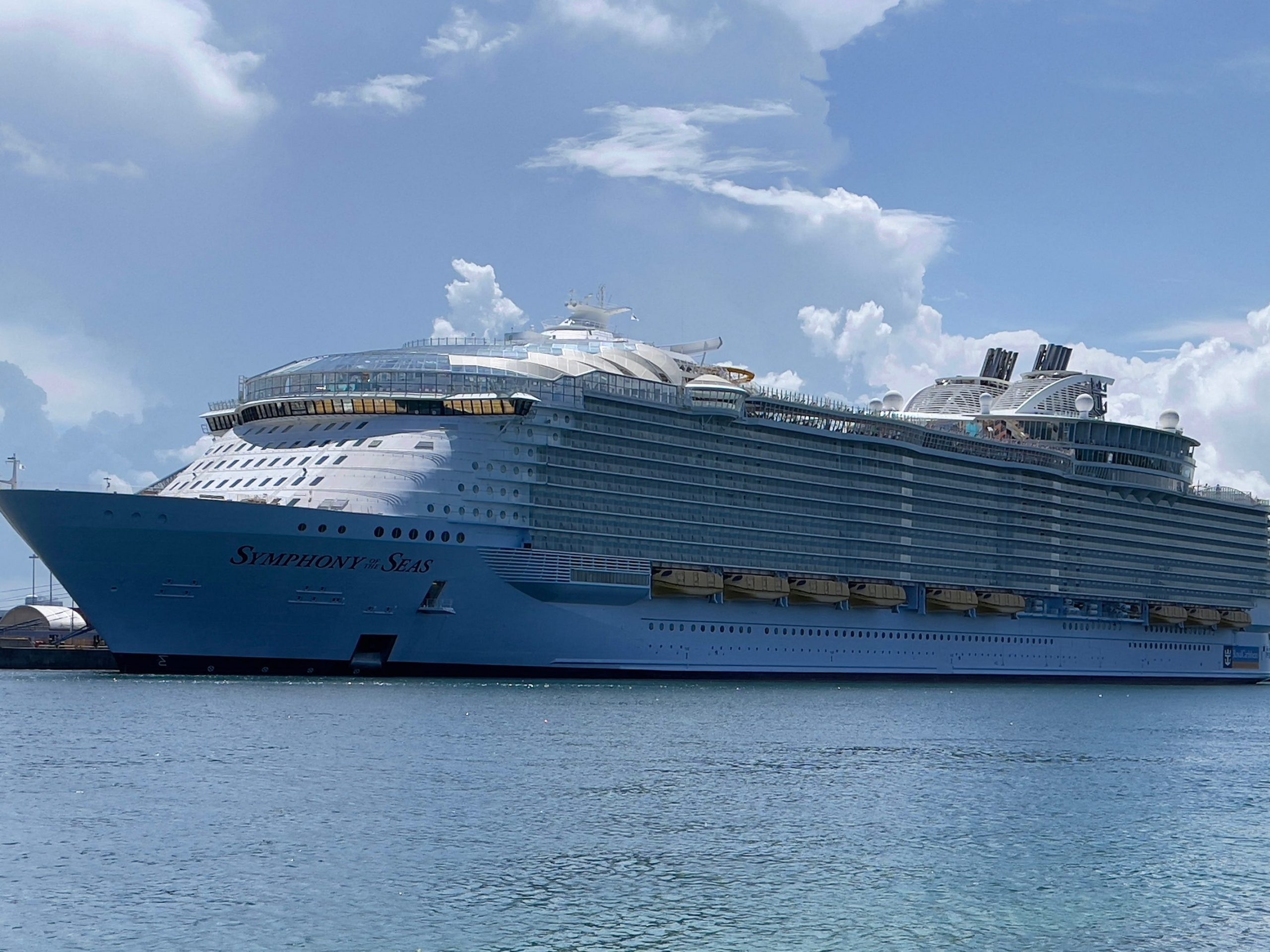 The Royal Caribbean cruise ship, Symphony of the Seas, is seen moored in the Port of Miami on August 1, 2021.