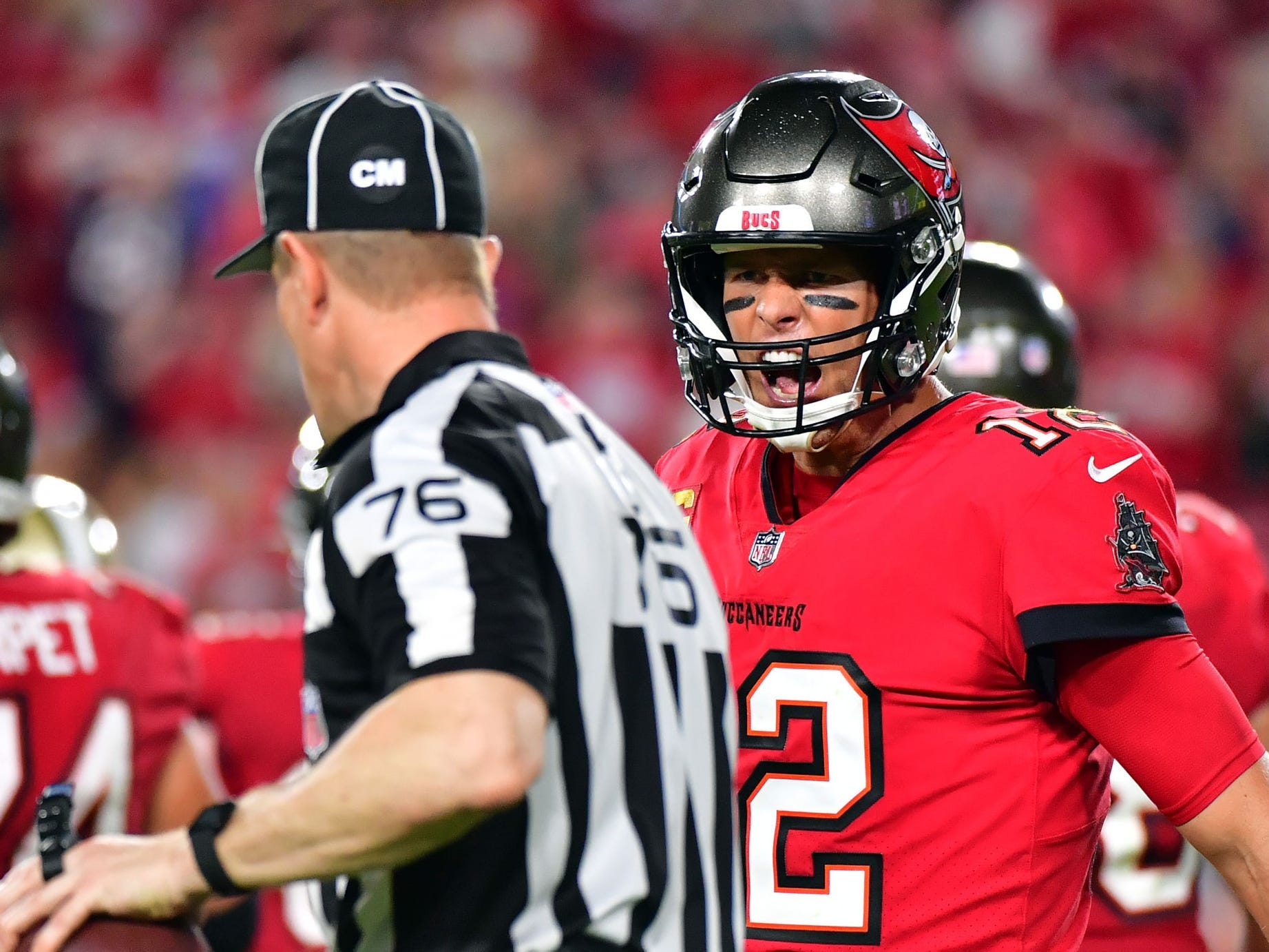 Tom Brady yells at a referee during a game against the New Orleans Saints.