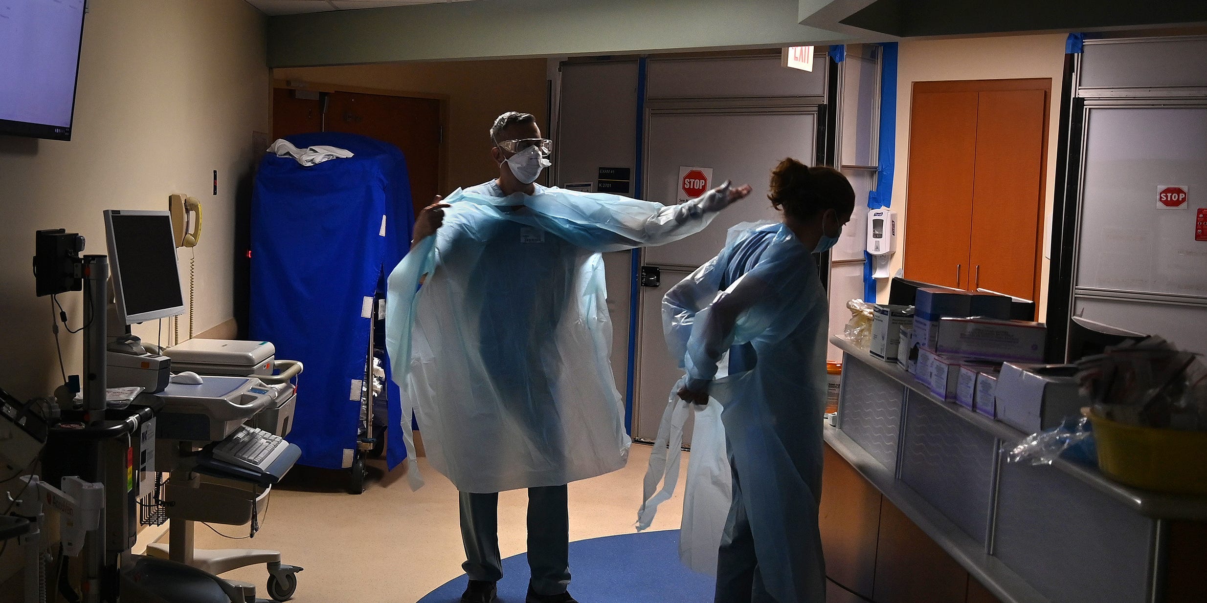 Two nurses in a Florida hospital puts on PPE