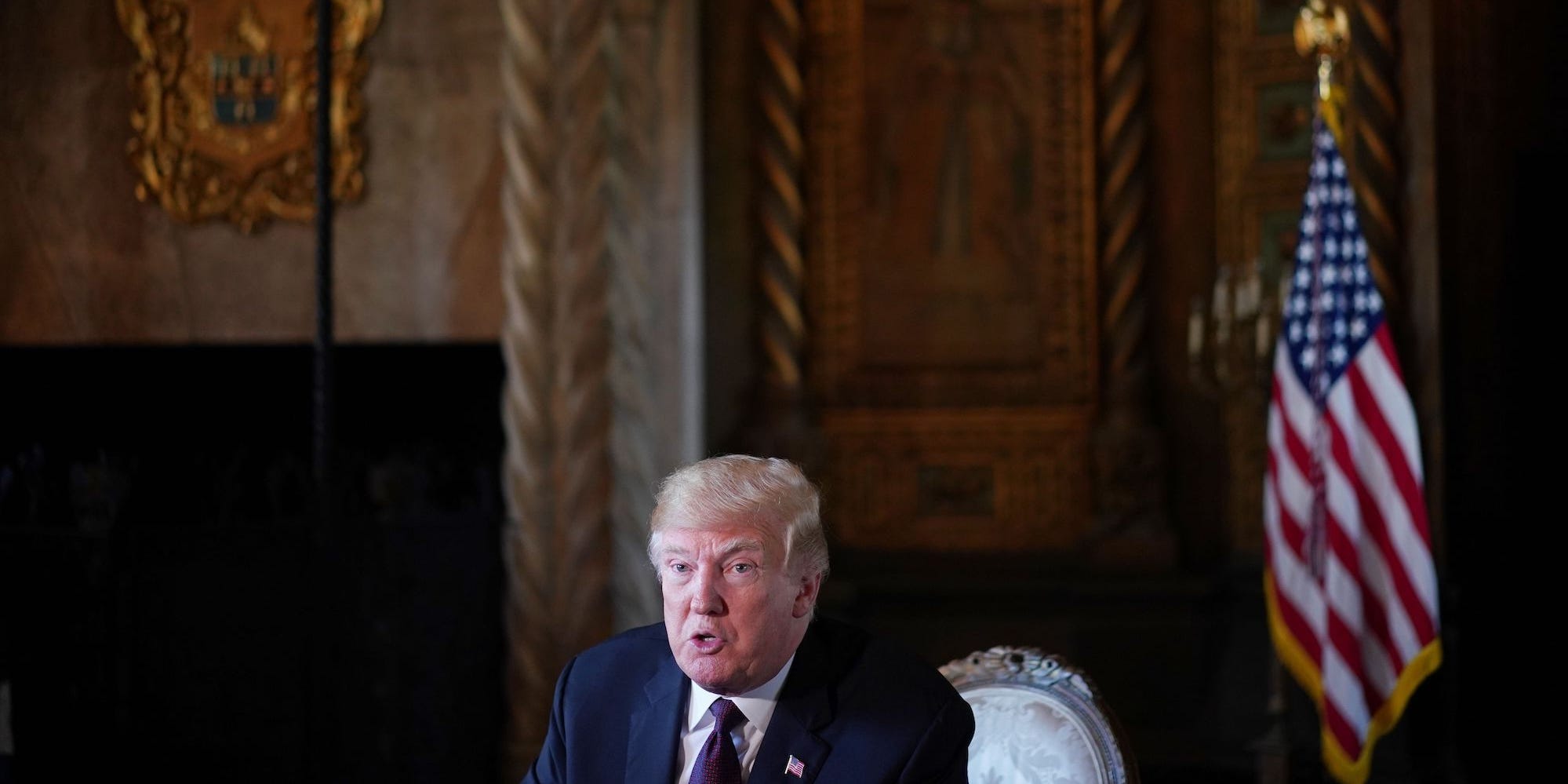 Former President Donald Trump speaks to the press at his Mar-a-Lago resort in Palm Beach, Florida, on November 22, 2018.