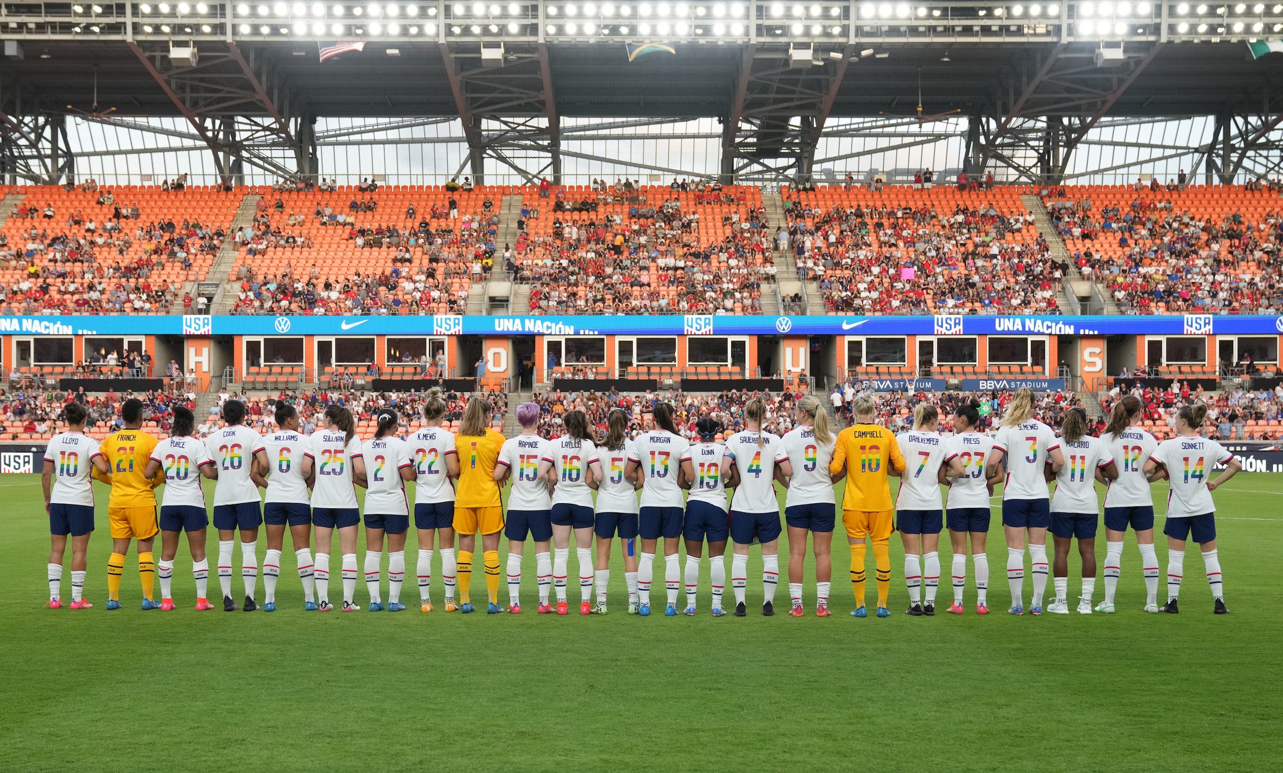 USWNT players pose in their pride jerseys ahead of a June matchup against Portugal.