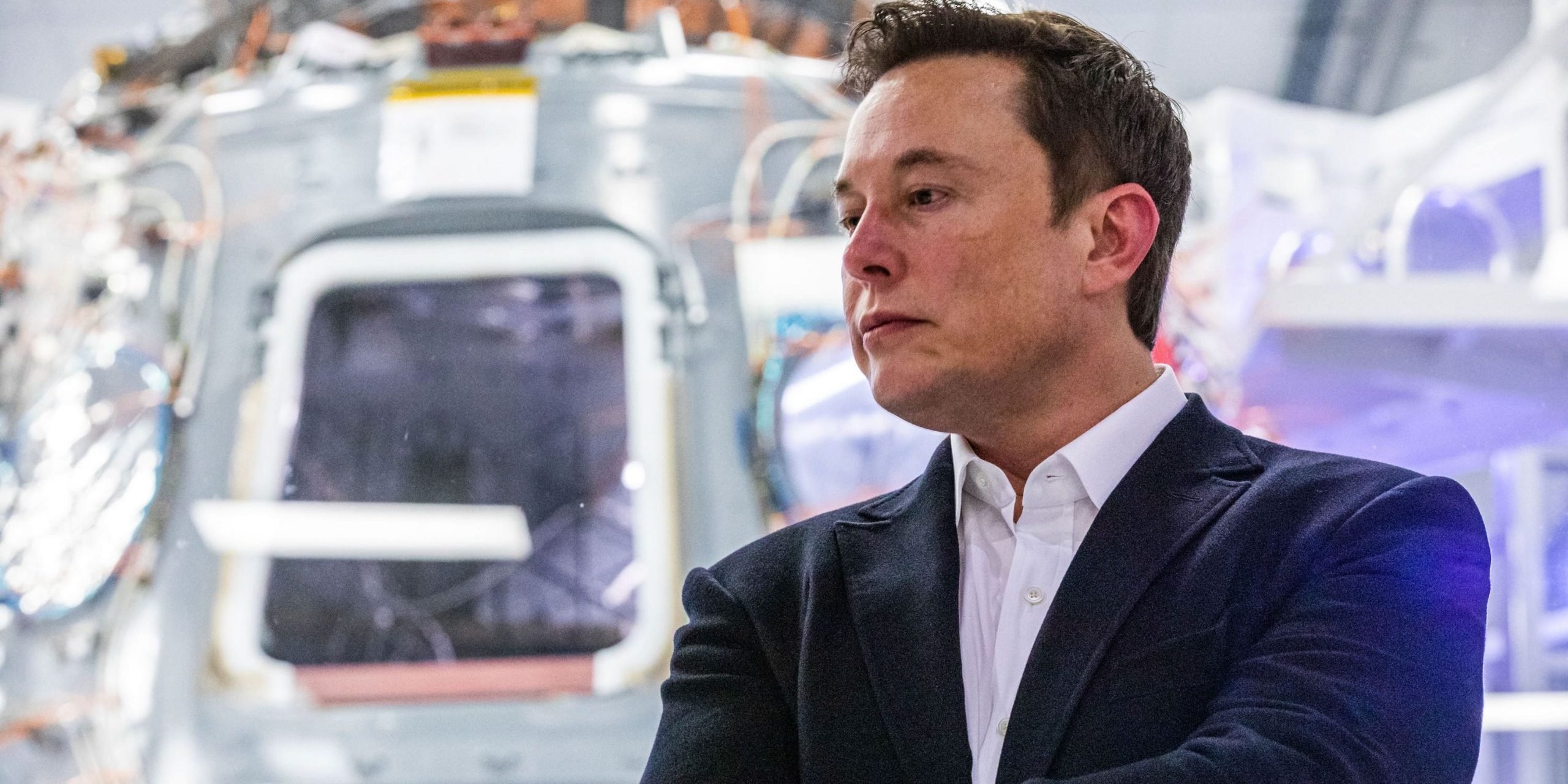 SpaceX founder Elon Musk addresses members of the media during a press conference announcing new developments of the Crew Dragon reusable spacecraft, at SpaceX headquarters in Hawthorne, California on October 10, 2019.