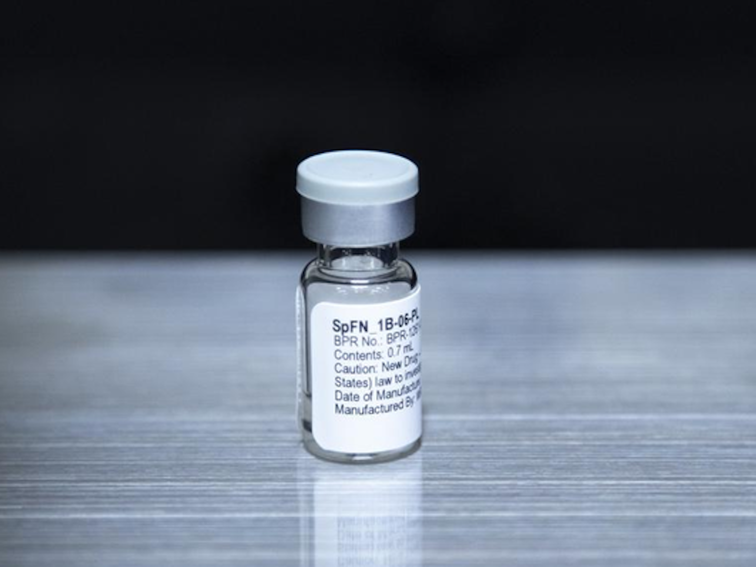 A vial of SpFN, the Army's vaccine against coronavirus variants, is shown.