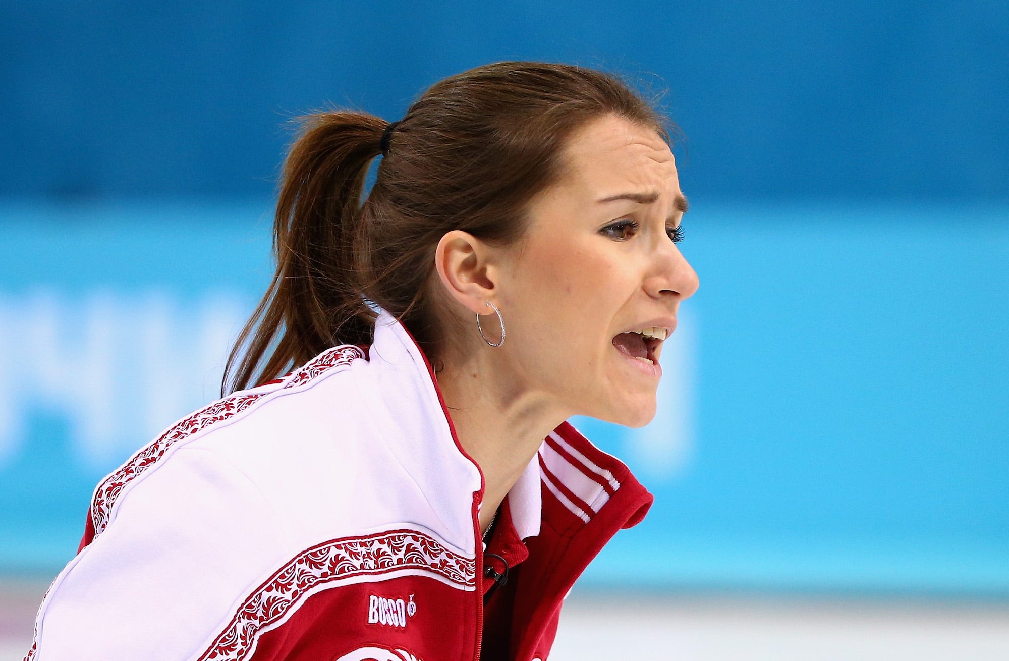 Anna Sidorova of Russia competes during the Curling Women's Round Robin match between Russia and Great Britain on day ten of the Sochi 2014 Winter Olympics at Ice Cube Curling Center