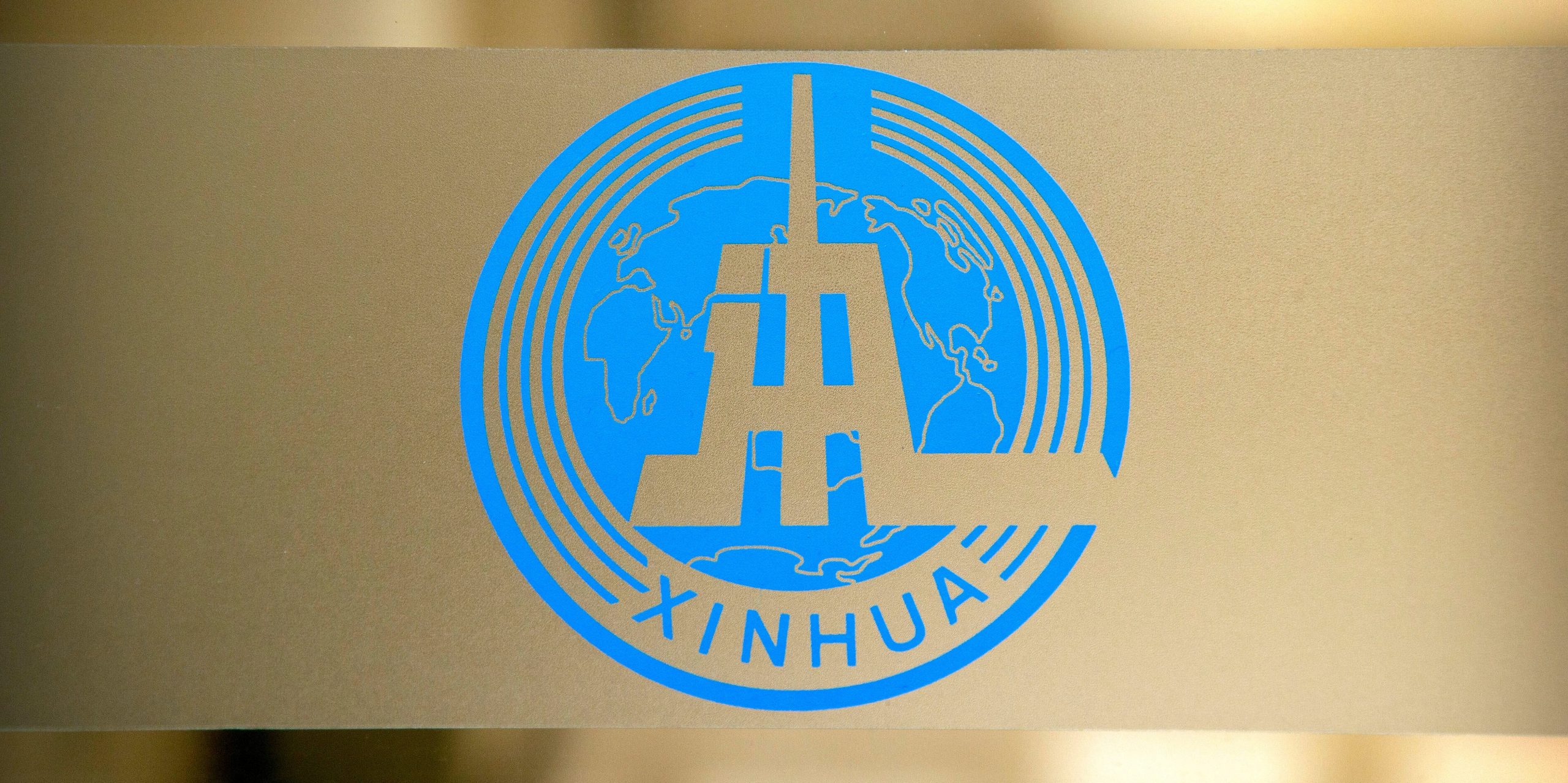 The blue logo of China's Xinhua News Agency